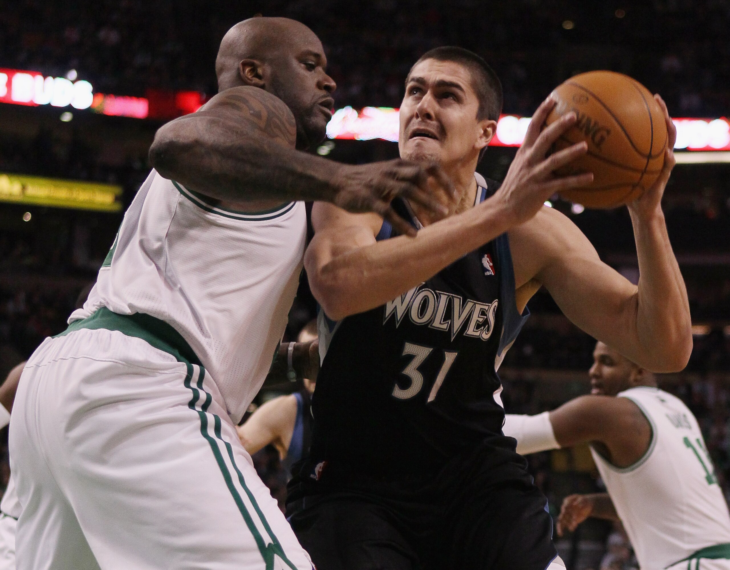 BOSTON, MA - JANUARY 03:  Darko Milicic #31 of the Minnesota Timberwolves tries to get around Shaquille O'Neal #36 of the Boston Celtics on January 3, 2011 at the TD Garden in Boston, Massachusetts. NOTE TO USER: User expressly acknowledges and agrees tha