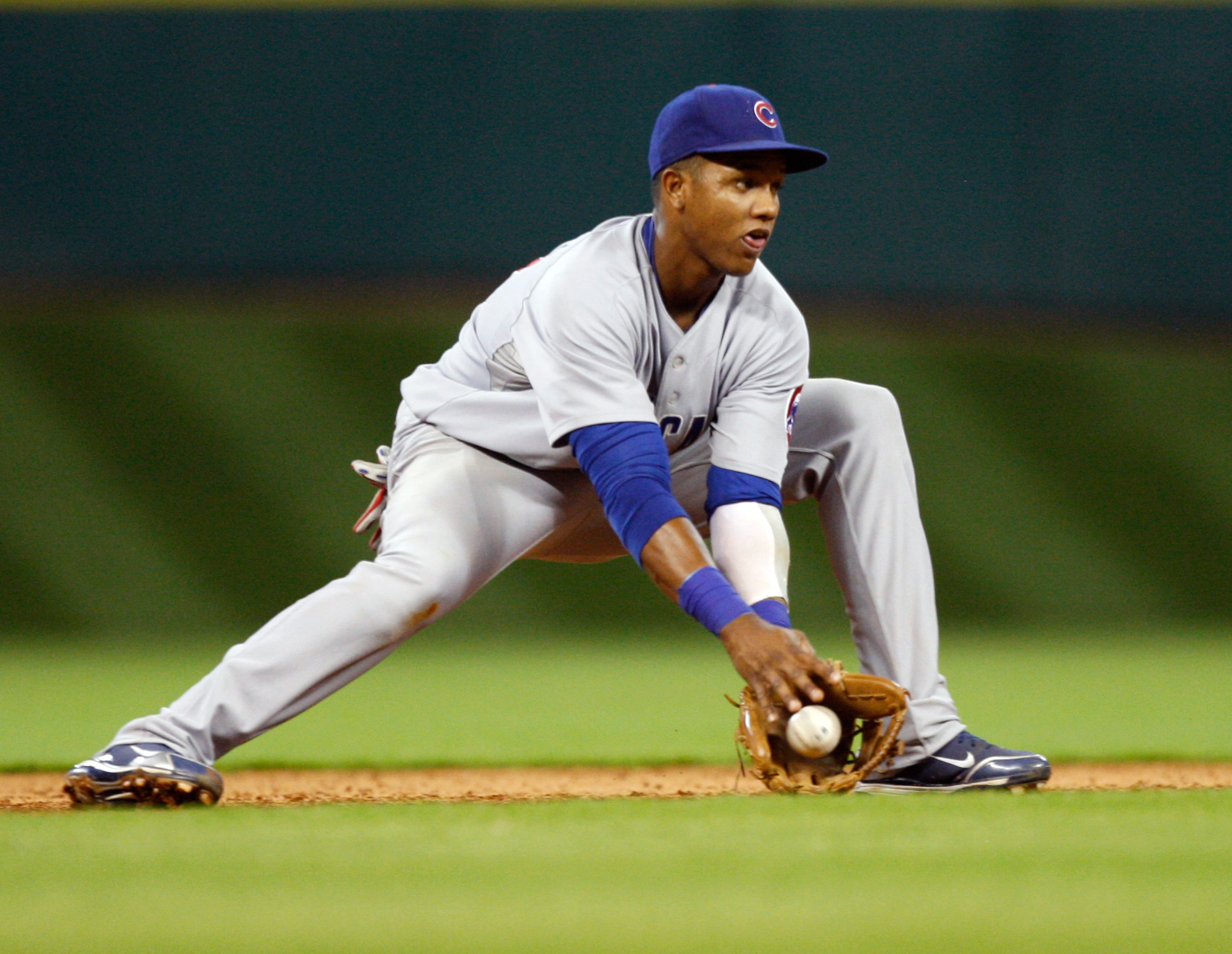 HOUSTON - JUNE 05: Shortstop Starlon Castro #13 of the Chicago Cubs fields a ground ball in the ninth inning against the Housto Astros at Minute Maid Park on June 5, 2010 in Houston, Texas. (Photo by Bob Levey/Getty Images) HOUSTON - JUNE 05: Shortstop Starlon Castro #13 of the Chicago Cubs fields a ground ball in the ninth inning against the Housto Astros at Minute Maid Park on June 5, 2010 in Houston, Texas. (Photo by Bob Levey/Getty Images)