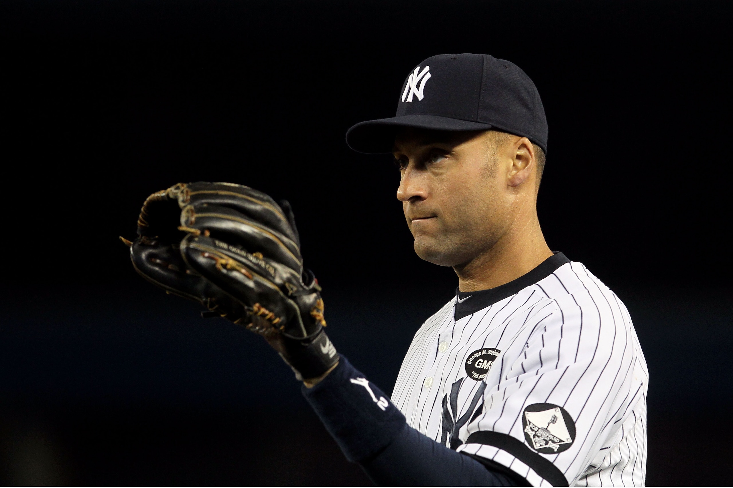 NEW YORK - OCTOBER 19: Derek Jeter #2 of the New York Yankees warms up against the Texas Rangers in Game Four of the ALCS during the 2010 MLB Playoffs at Yankee Stadium on October 19, 2010 in the Bronx borough of New York City. The Rangers won 10-3. (Ph NEW YORK - OCTOBER 19: Derek Jeter #2 of the New York Yankees warms up against the Texas Rangers in Game Four of the ALCS during the 2010 MLB Playoffs at Yankee Stadium on October 19, 2010 in the Bronx borough of New York City. The Rangers won 10-3. (Ph