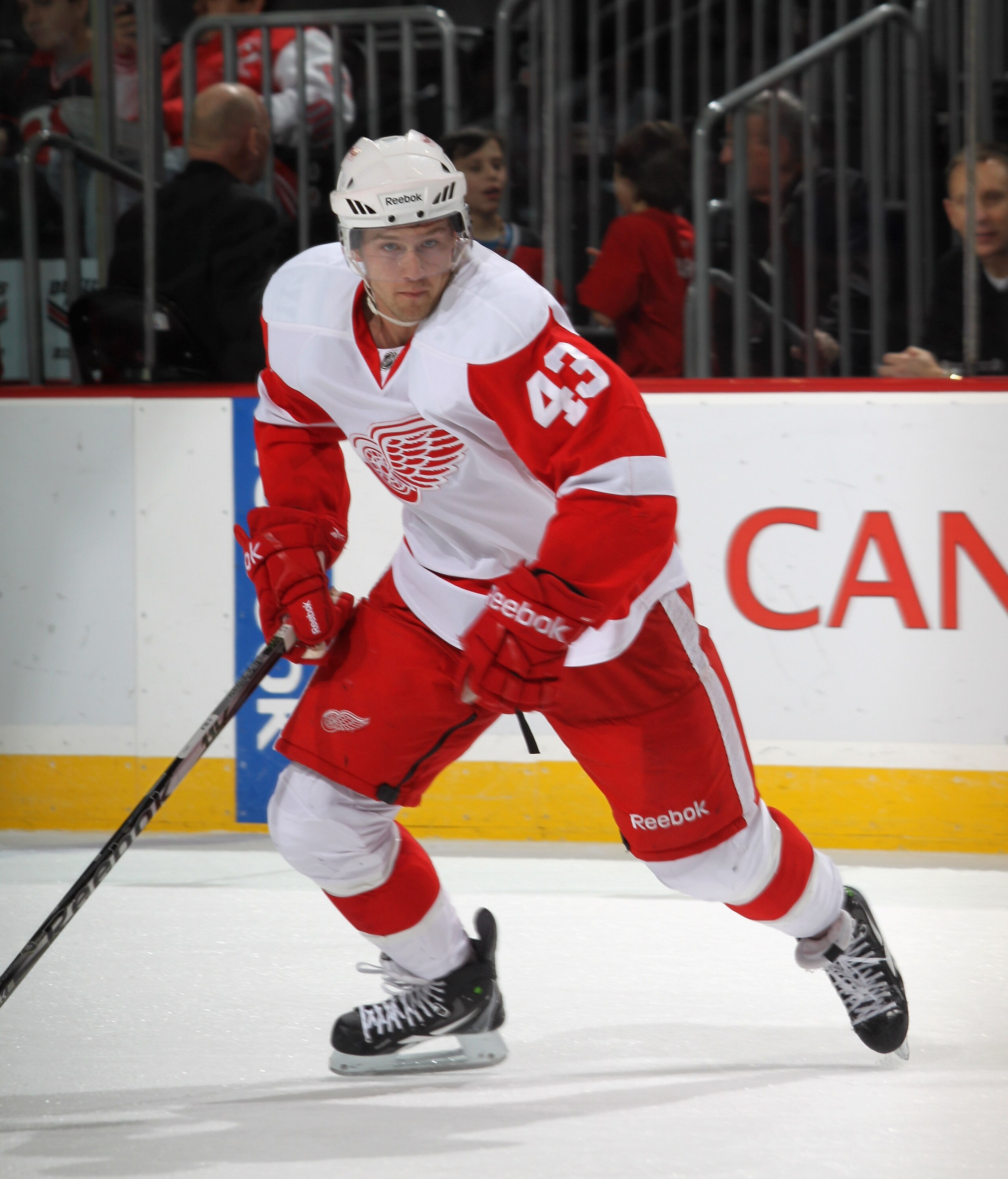 NEWARK, NJ - DECEMBER 11:  Darren Helm #43 of the Detroit Red Wings skates against the New Jersey Devils at the Prudential Center on December 11, 2010 in Newark, New Jersey. The Red Wings defeated the the Devils 4-1.  (Photo by Bruce Bennett/Getty Images)