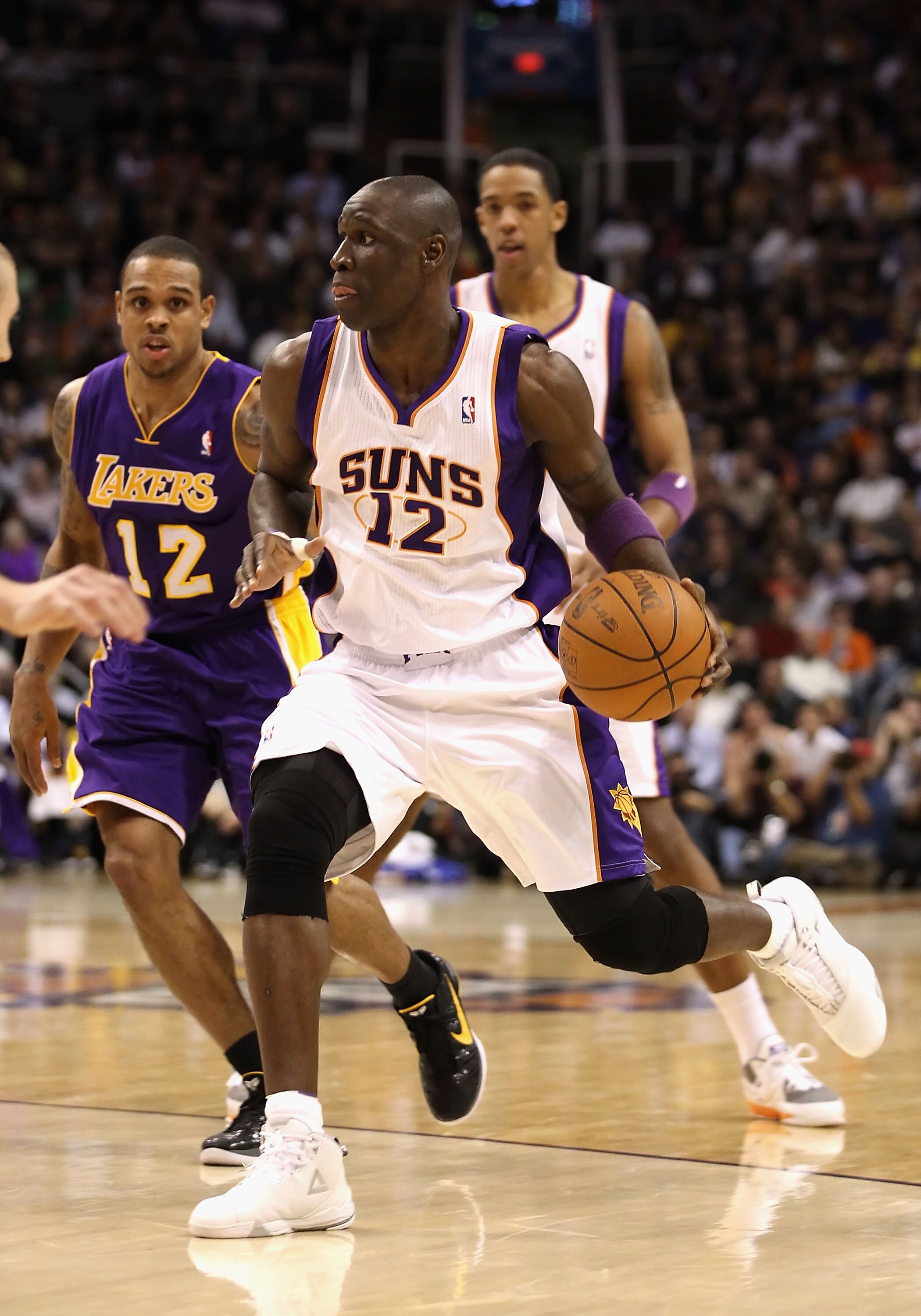 PHOENIX, AZ - JANUARY 05:  Mickael Pietrus #12 of the Phoenix Suns handles the ball during the NBA game against the Los Angeles Lakers at US Airways Center on January 5, 2011 in Phoenix, Arizona. The Lakers defeated the Suns 99-95.  NOTE TO USER: User exp