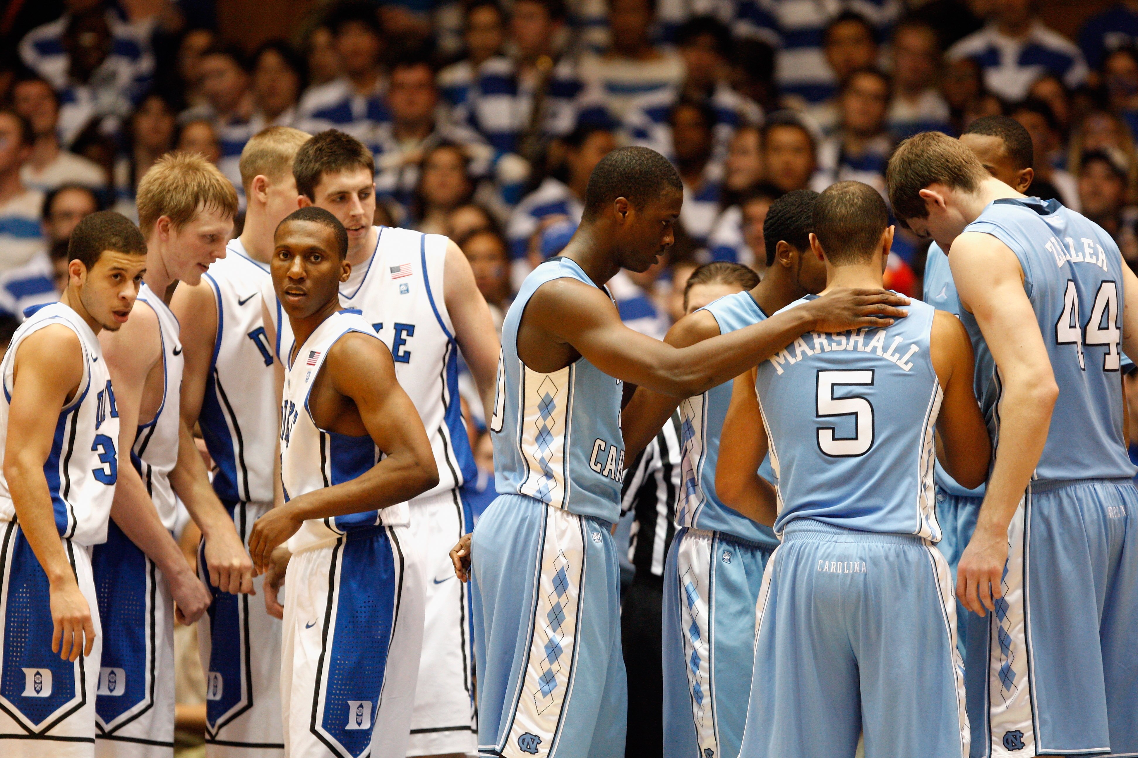 DURHAM, NC - FEBRUARY 09:  Seth Curry #30 and Nolan Smith of the Duke Blue Devils watch on against the North Carolina Tar Heels during their game at Cameron Indoor Stadium on February 9, 2011 in Durham, North Carolina.  (Photo by Streeter Lecka/Getty Imag