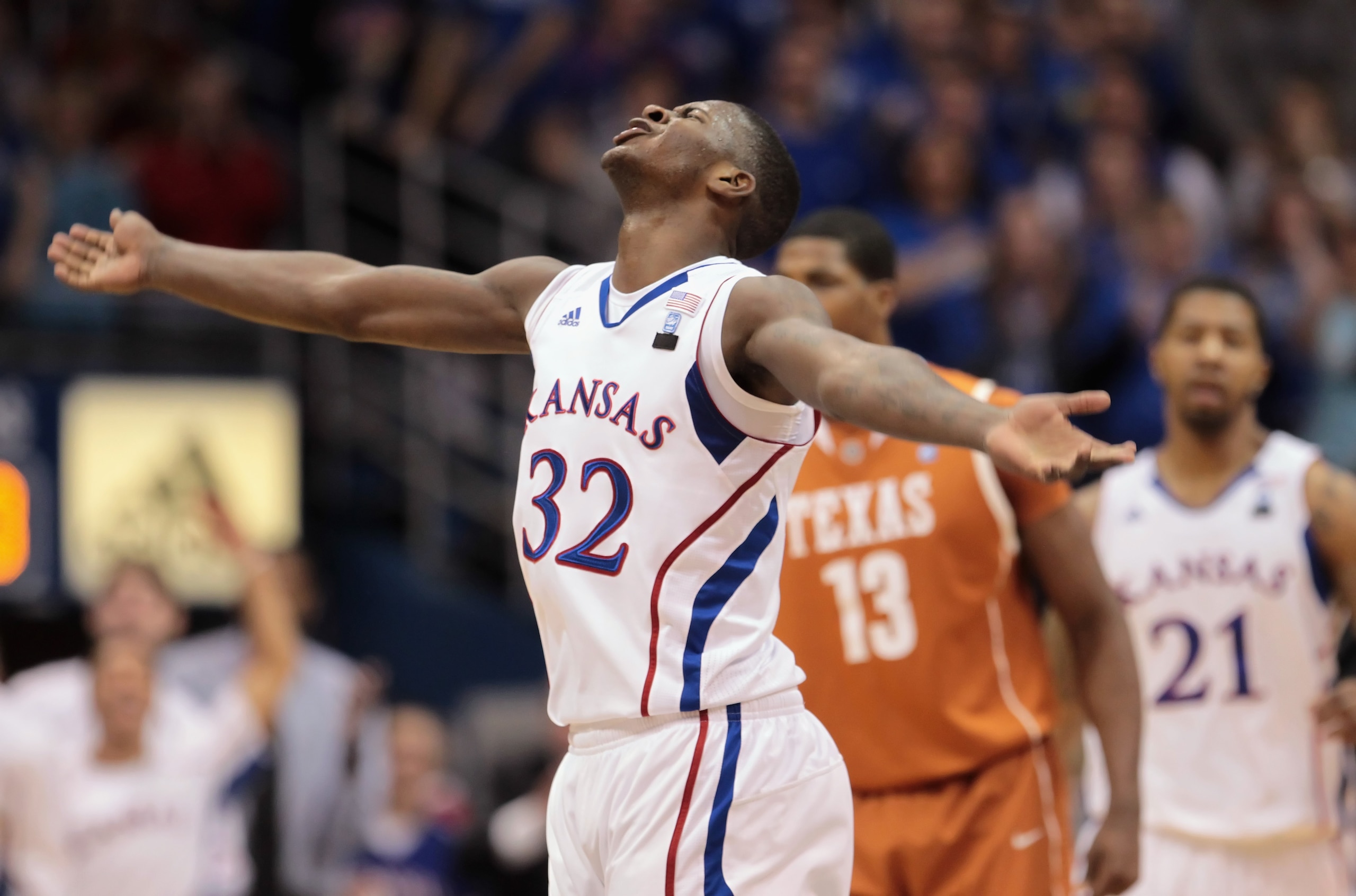 LAWRENCE, KS - JANUARY 22:  Josh Selby #32 of the Kansas Jayhawks reacts after scoring during the game against the Texas Longhorns on January 22, 2011 at Allen Fieldhouse in Lawrence, Kansas.  (Photo by Jamie Squire/Getty Images)