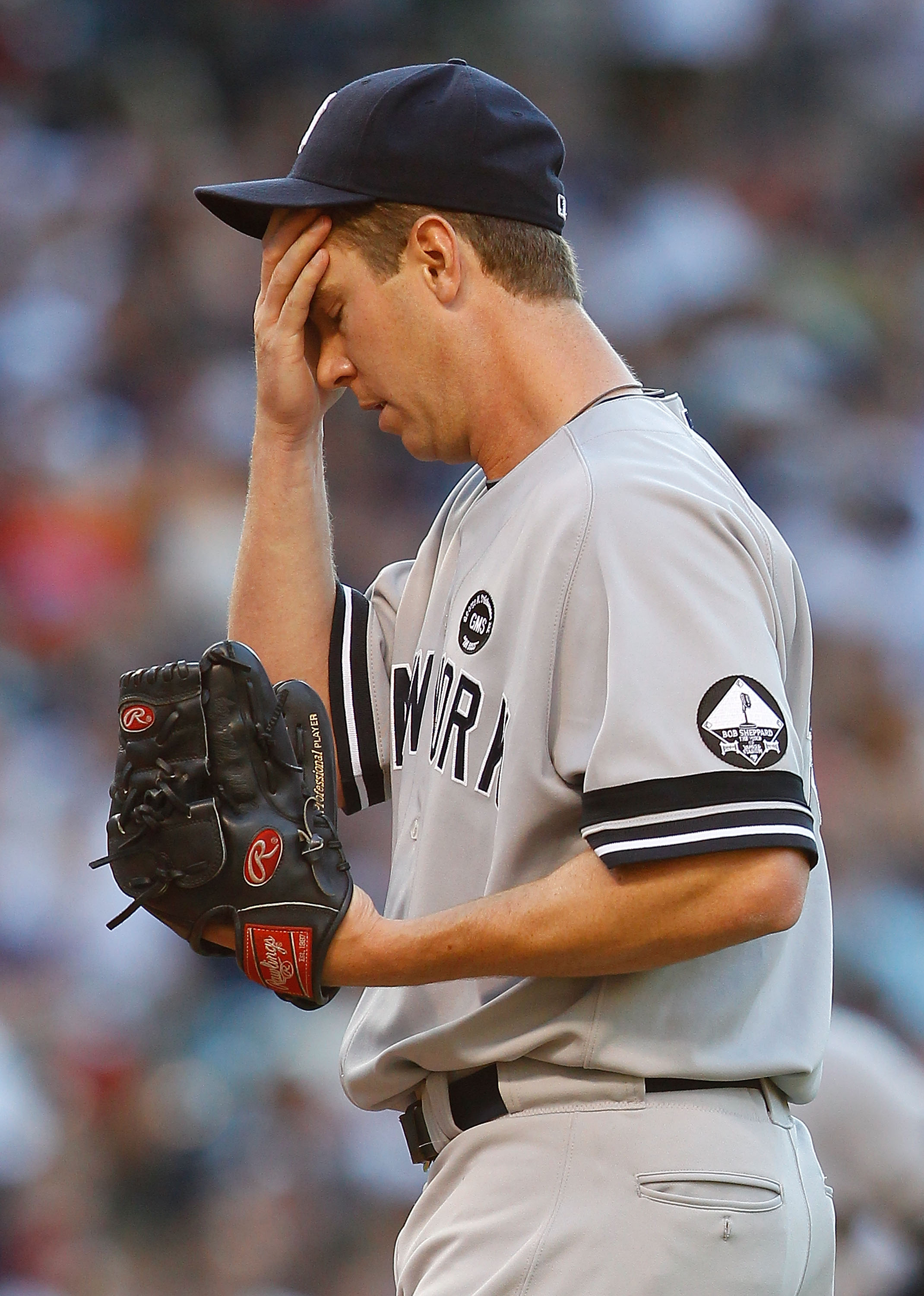 CLEVELAND - JULY 29:  Dustin Mosely #40 of the New York Yankees takes a moment inbetween pitches during the game against the Cleveland Indians on July 29, 2010 at Progressive Field in Cleveland, Ohio.  (Photo by Jared Wickerham/Getty Images)