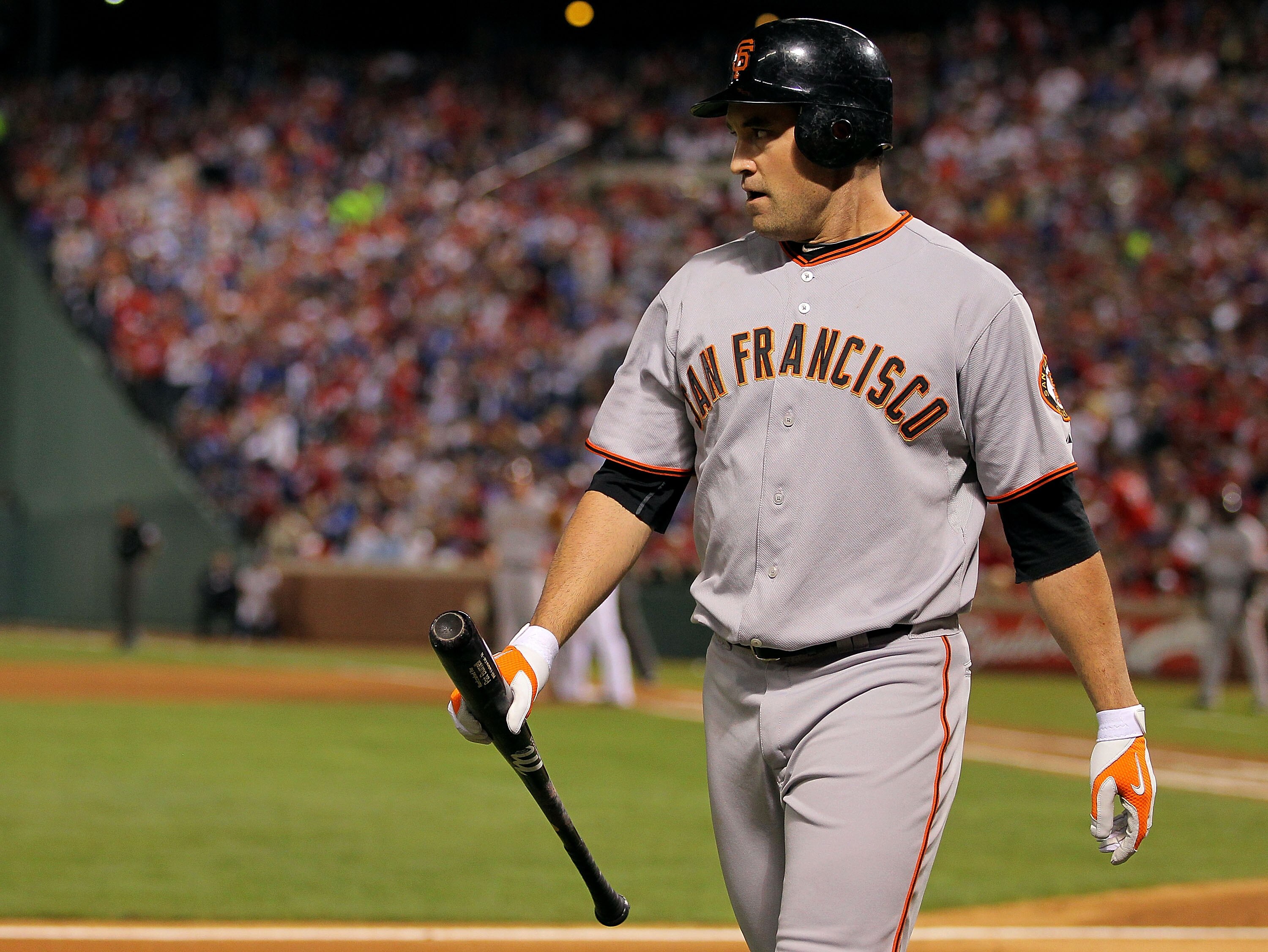 ARLINGTON, TX - NOVEMBER 01:  Pat Burrell #9 of the San Francisco Giants reacts as he walks back to the dugout in the fifth inning against the Texas Rangers in Game Five of the 2010 MLB World Series at Rangers Ballpark in Arlington on November 1, 2010 in