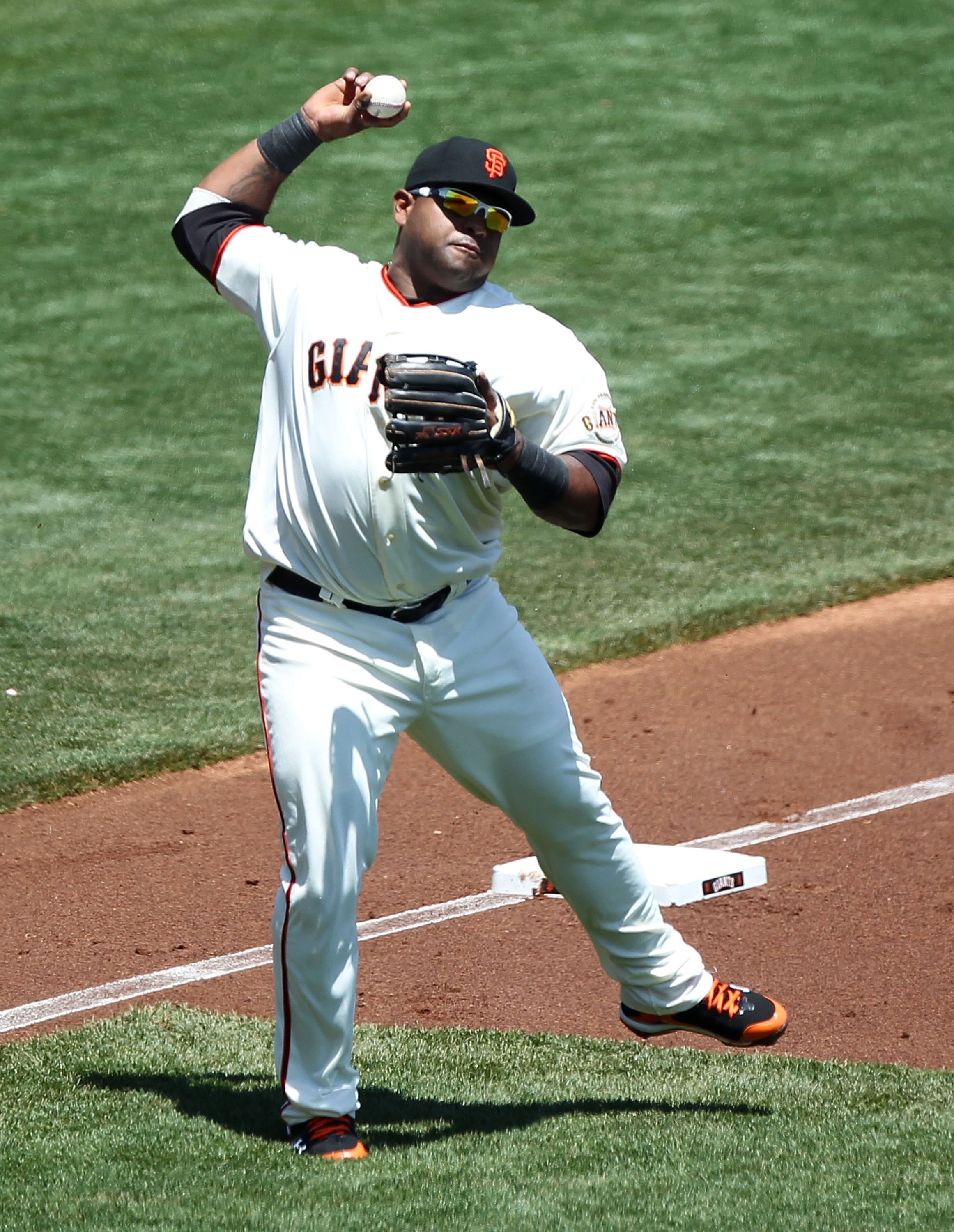 SAN FRANCISCO - MAY 13:  Pablo Sandoval #48 of the San Francisco Giants fields a ball against the San Diego Padres during an MLB game at AT&T Park on May 13, 2010 in San Francisco, California.  (Photo by Jed Jacobsohn/Getty Images)