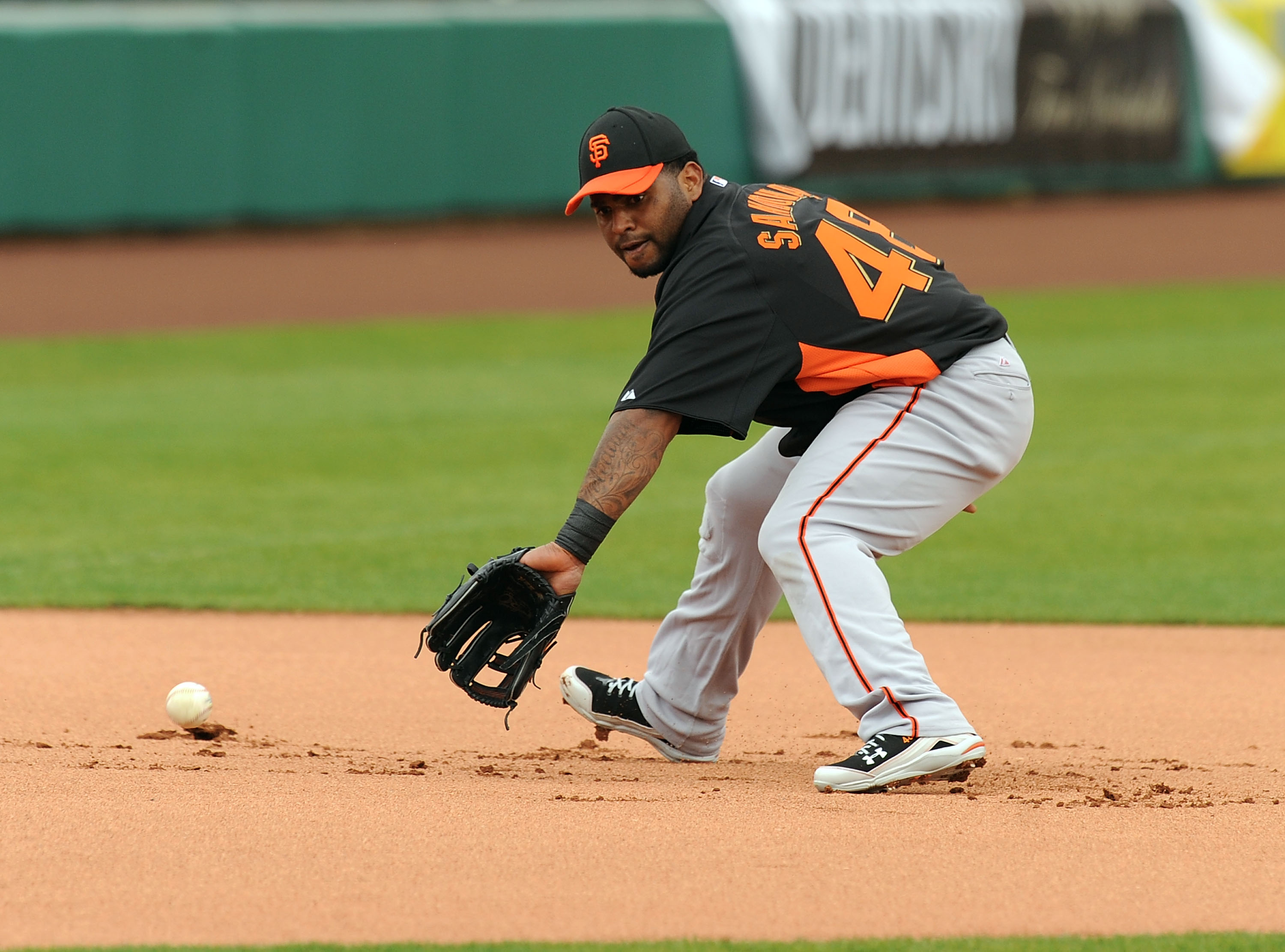 SCOTTSDALE, AZ - FEBRUARY 19:  Pablo Sandoval #48 of the San Francisco Giants takes a ground ball during infield drills at Scottsdale Stadium on February 19, 2011 in Scottsdale, Arizona.  (Photo by Norm Hall/Getty Images)