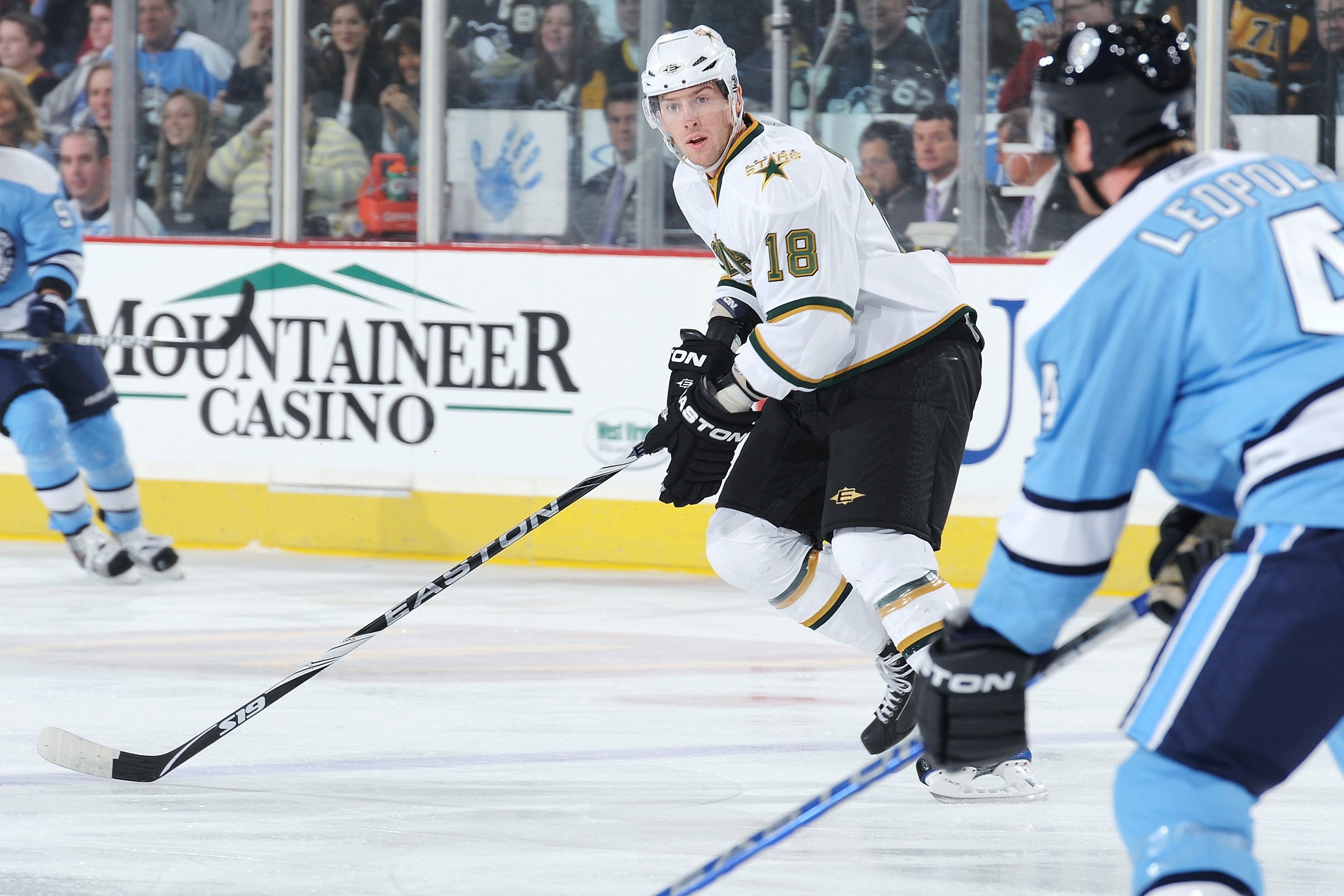 PITTSBURGH - MARCH 6:  Forward James Neal #18 of the Dallas Stars skates with the puck against the Pittsburgh Penguins on March 6, 2010 at Mellon Arena in Pittsburgh, Pennsylvania.  (Photo by Jamie Sabau/Getty Images)
