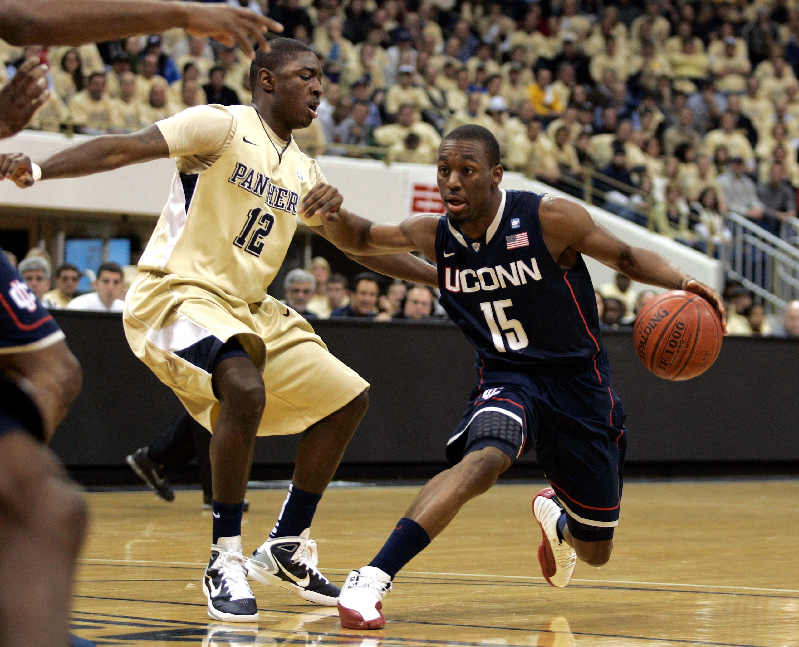 PITTSBURGH, PA - DECEMBER 27: Kemba Walker #15 of the Connecticut Huskies drives to the basket against Ashton Gibbs #12 of the Pittsburgh Panthers at Petersen Events Center on December 27, 2010 in Pittsburgh, Pennsylvania. (Photo by Justin K. Aller/Gett PITTSBURGH, PA - DECEMBER 27: Kemba Walker #15 of the Connecticut Huskies drives to the basket against Ashton Gibbs #12 of the Pittsburgh Panthers at Petersen Events Center on December 27, 2010 in Pittsburgh, Pennsylvania. (Photo by Justin K. Aller/Gett