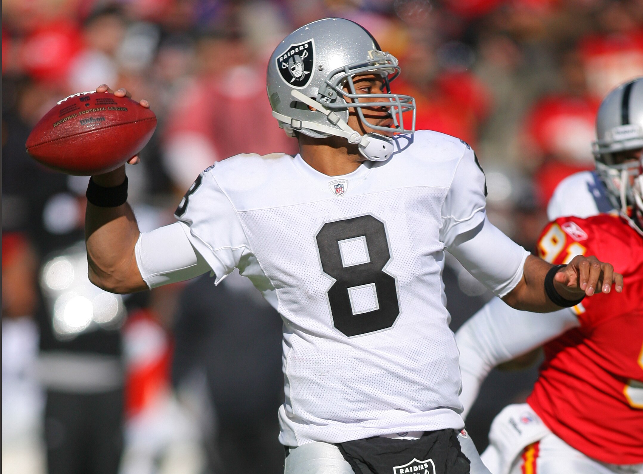 KANSAS CITY, MO - JANUARY 02:  Quarterback Jason Campbell #8 of the Oakland Raiders throws a pass in a game against the Kansas City Chiefs at Arrowhead Stadium on January 2, 2011 in Kansas City, Missouri.  (Photo by Tim Umphrey/Getty Images)