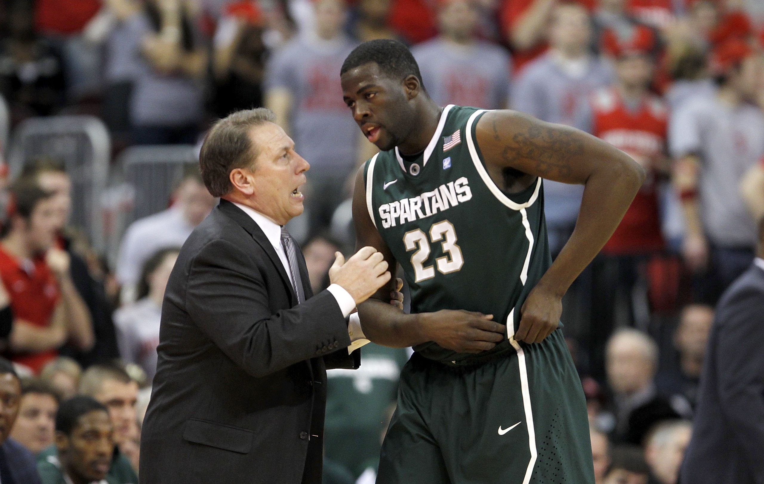 COLUMBUS, OH - FEBRUARY 15: Head Coach Tom Izzo speaks with Draymond Green #23, both of the Michigan State Spartans, during the first half against the Ohio State Buckeyes on February 15, 2011 at Value City Arena in Columbus, Ohio. (Photo by Gregory Sham COLUMBUS, OH - FEBRUARY 15: Head Coach Tom Izzo speaks with Draymond Green #23, both of the Michigan State Spartans, during the first half against the Ohio State Buckeyes on February 15, 2011 at Value City Arena in Columbus, Ohio. (Photo by Gregory Sham