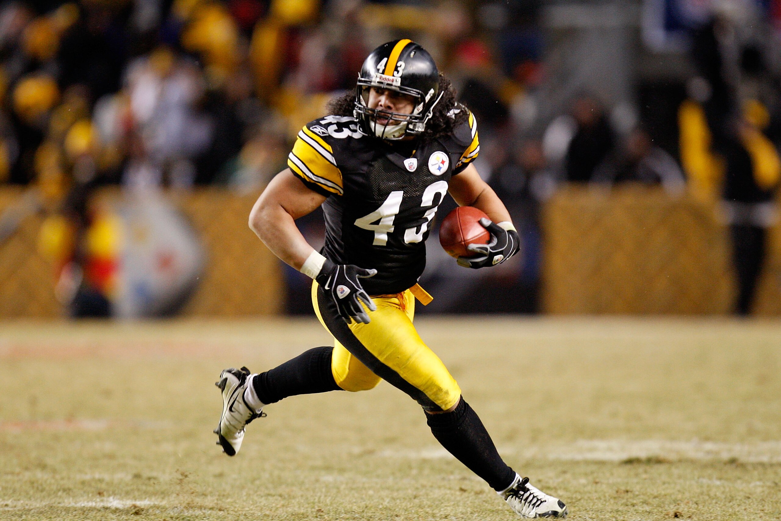 PITTSBURGH - JANUARY 18: Troy Polamalu #43 of the Pittsburgh Steelers returns an interception 40 yards for a touchdown against the Baltimore Ravens during the fourth quarter of the AFC championship game on January 18, 2009 at Heinz Field in Pittsburgh, P PITTSBURGH - JANUARY 18: Troy Polamalu #43 of the Pittsburgh Steelers returns an interception 40 yards for a touchdown against the Baltimore Ravens during the fourth quarter of the AFC championship game on January 18, 2009 at Heinz Field in Pittsburgh, P