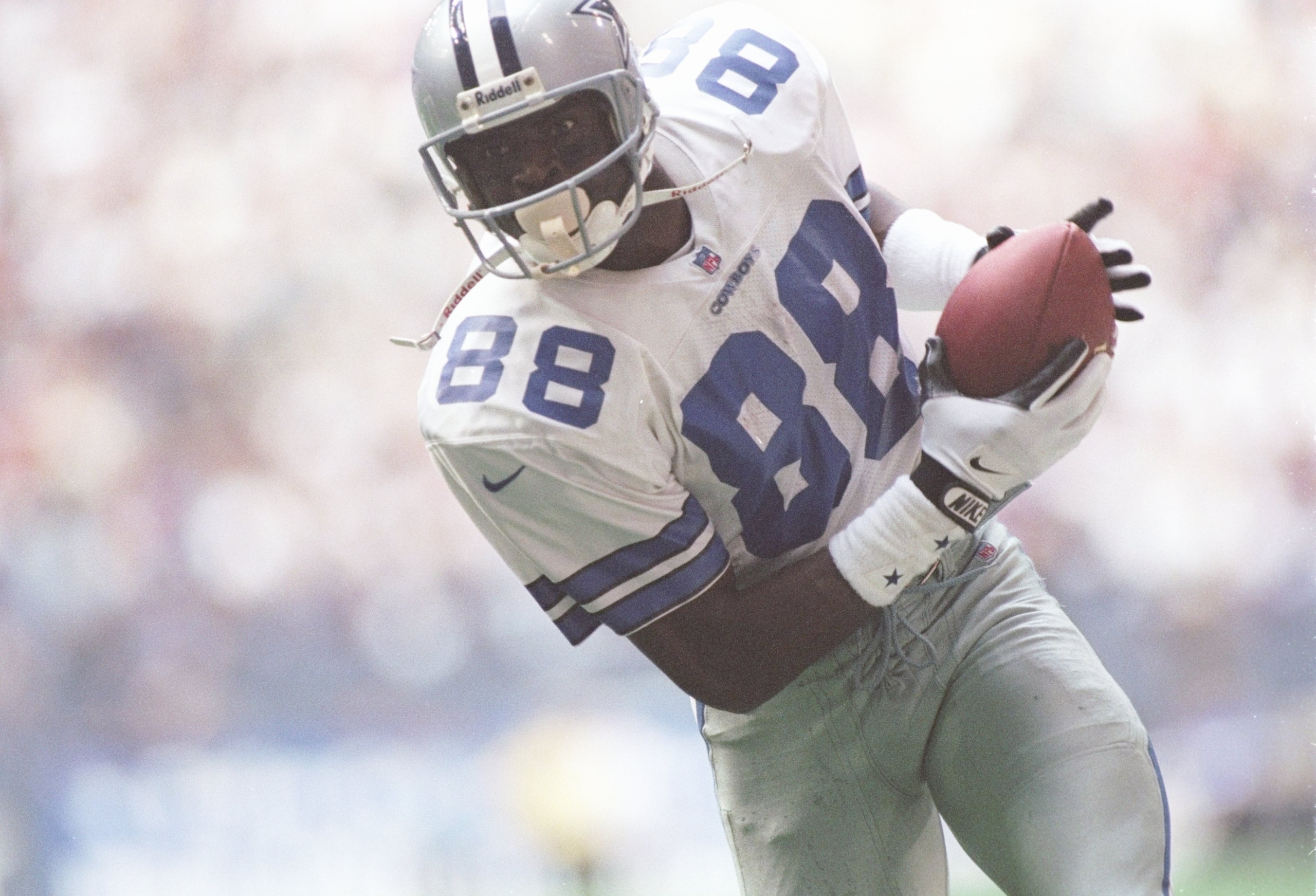 28 Dec 1996: Wide receiver Michael Irvin of the Dallas Cowboys moves down the field during a game against the Minnesota Vikings at Texas Stadium in Irving, Texas. The Cowboys won the game, 40-15. Mandatory Credit: Brian Bahr /Allsport 28 Dec 1996: Wide receiver Michael Irvin of the Dallas Cowboys moves down the field during a game against the Minnesota Vikings at Texas Stadium in Irving, Texas. The Cowboys won the game, 40-15. Mandatory Credit: Brian Bahr /Allsport