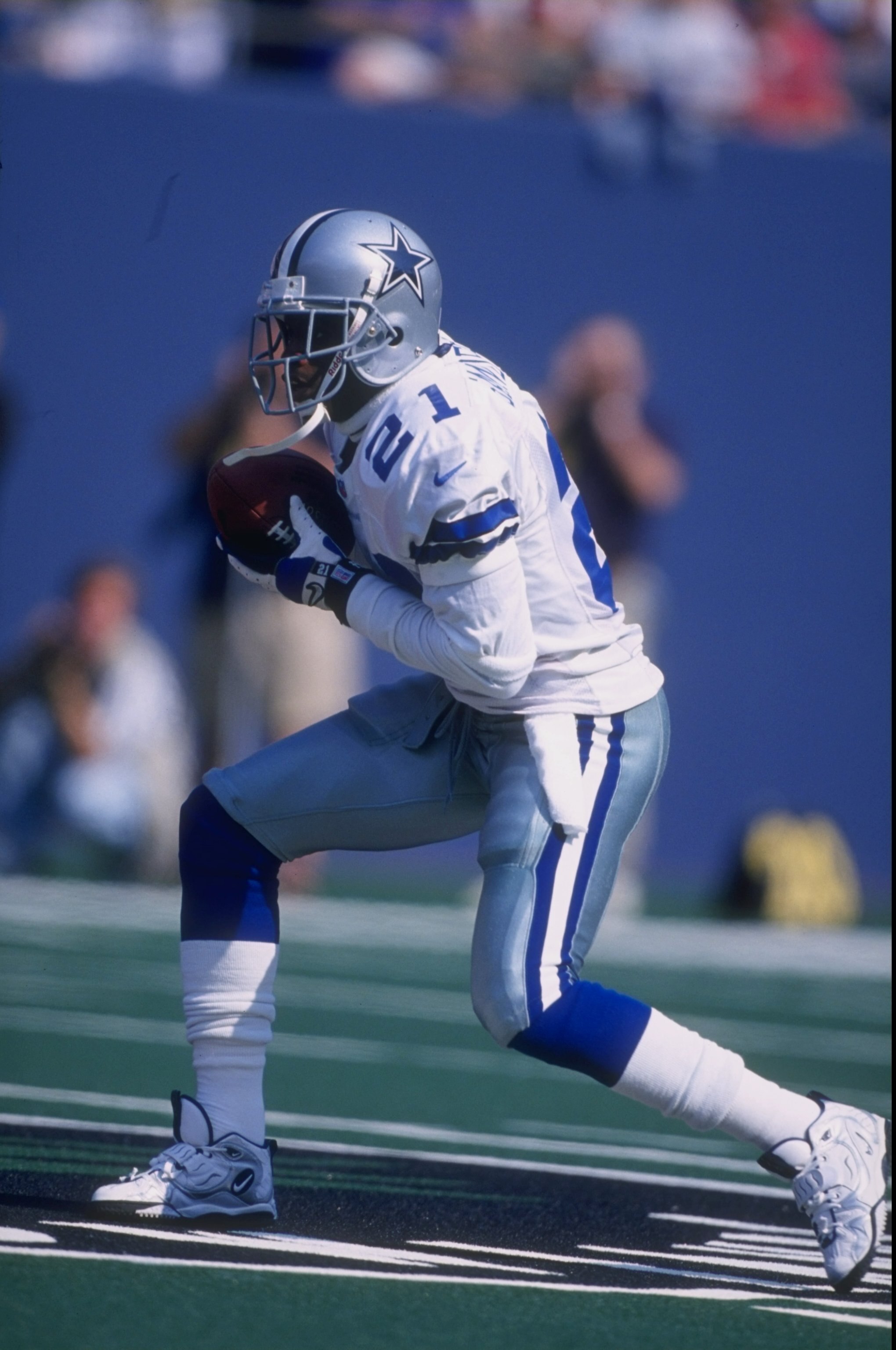 4 Oct 1997:  Deion Sanders #21 of the Dallas Cowboys in action during a game against the New York Giants at the Meadowlands in East Rutherford, New Jersey. The Giants defeated the Cowboys 20-17. Mandatory Credit: Al Bello  /Allsport