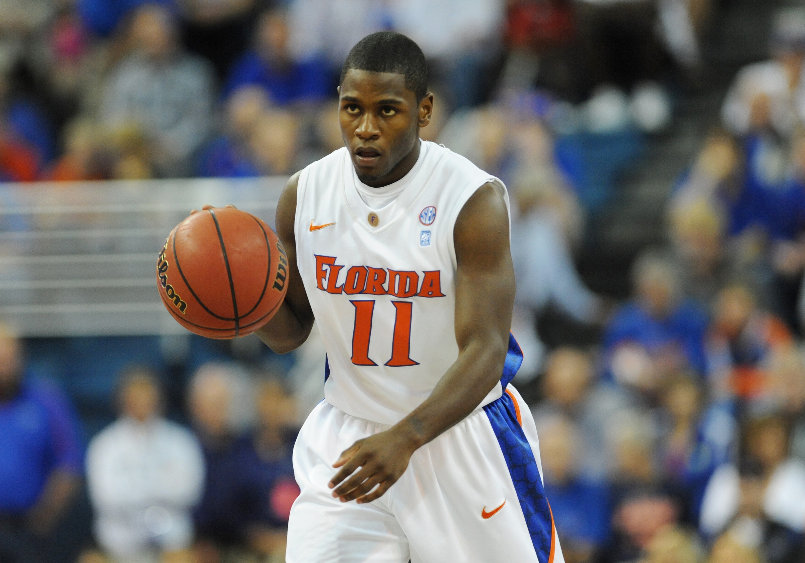 GAINESVILLE, FL - NOVEMBER 16: Guard Erving Walker #11 of the Florida Gators plays against the Ohio State Buckeyes November 16, 2010 at the Stephen C. O'Connell Center in Gainesville, Florida. (Photo by Al Messerschmidt/Getty Images) GAINESVILLE, FL - NOVEMBER 16: Guard Erving Walker #11 of the Florida Gators plays against the Ohio State Buckeyes November 16, 2010 at the Stephen C. O'Connell Center in Gainesville, Florida. (Photo by Al Messerschmidt/Getty Images)