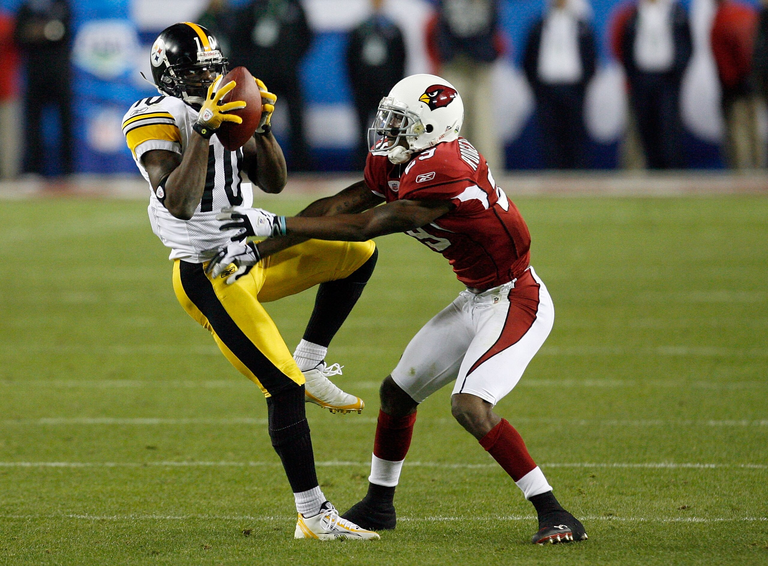 TAMPA, FL - FEBRUARY 01: Santonio Holmes #10 of the Pittsburgh Steelers makes a reception against the Arizona Cardinals during Super Bowl XLIII on February 1, 2009 at Raymond James Stadium in Tampa, Florida. (Photo by Kevin C. Cox/Getty Images) TAMPA, FL - FEBRUARY 01: Santonio Holmes #10 of the Pittsburgh Steelers makes a reception against the Arizona Cardinals during Super Bowl XLIII on February 1, 2009 at Raymond James Stadium in Tampa, Florida. (Photo by Kevin C. Cox/Getty Images)