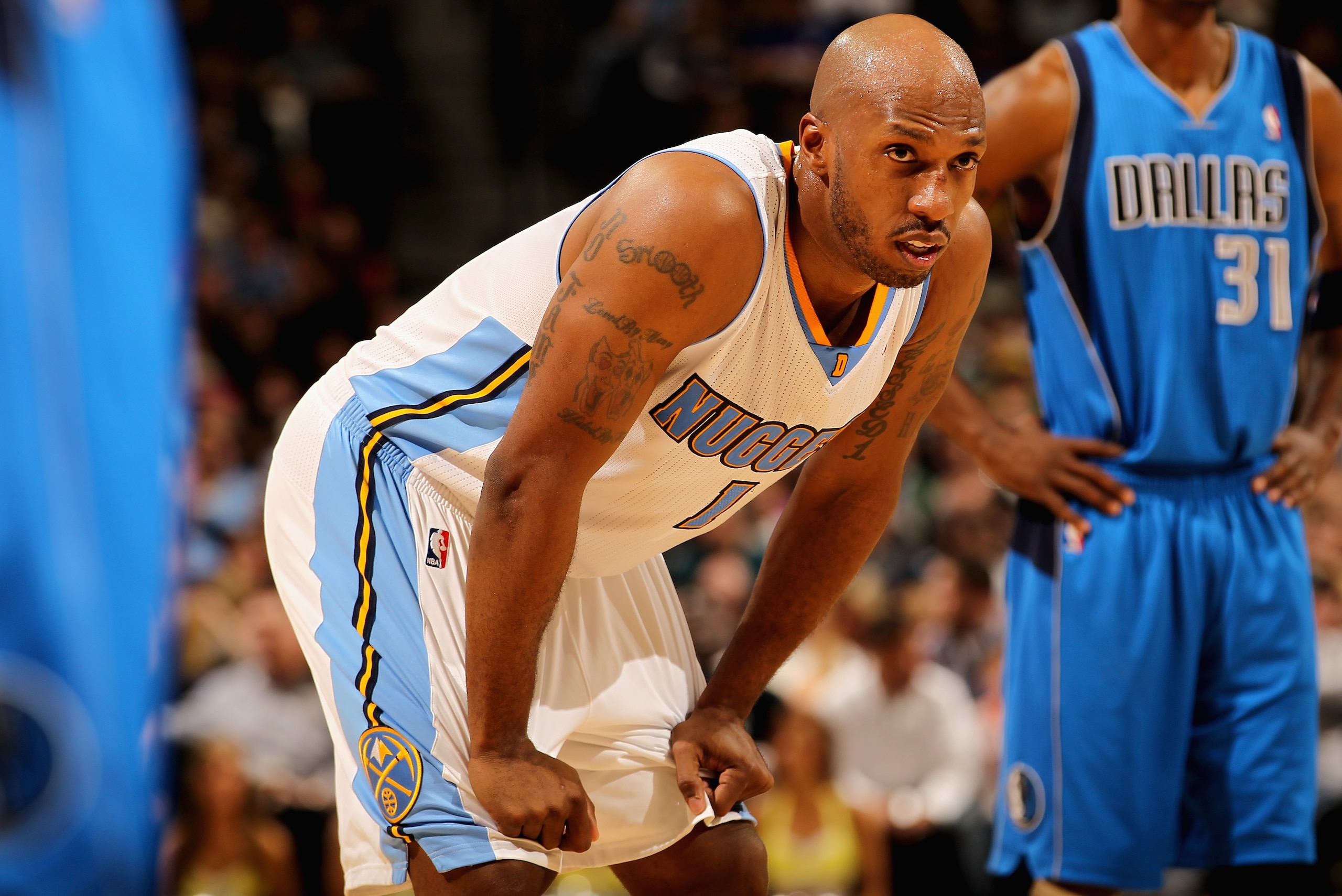 DENVER, CO - FEBRUARY 10:  Chauncey Billups #1 of the Denver Nuggets looks on during a break in the action as he had 22 first half points against the Dallas Mavericks during NBA action at the Pepsi Center on February 10, 2011 in Denver, Colorado. NOTE TO