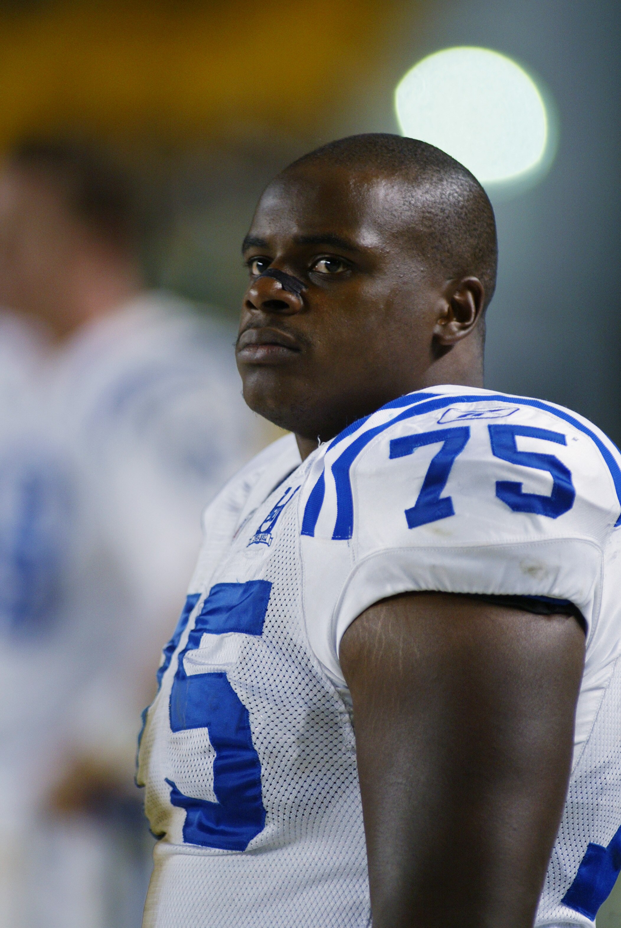 PITTSBURGH, PA - OCTOBER 21:   Defensive Tackle Larry Tripplett #75 of the Indianapolis Colts stands on the sideline during the NFL game against the Pittsburgh Steelers at Heinz Field on October 21, 2002 in Pittsburgh, Pennsylvania. Pittsburgh won 28-10.(