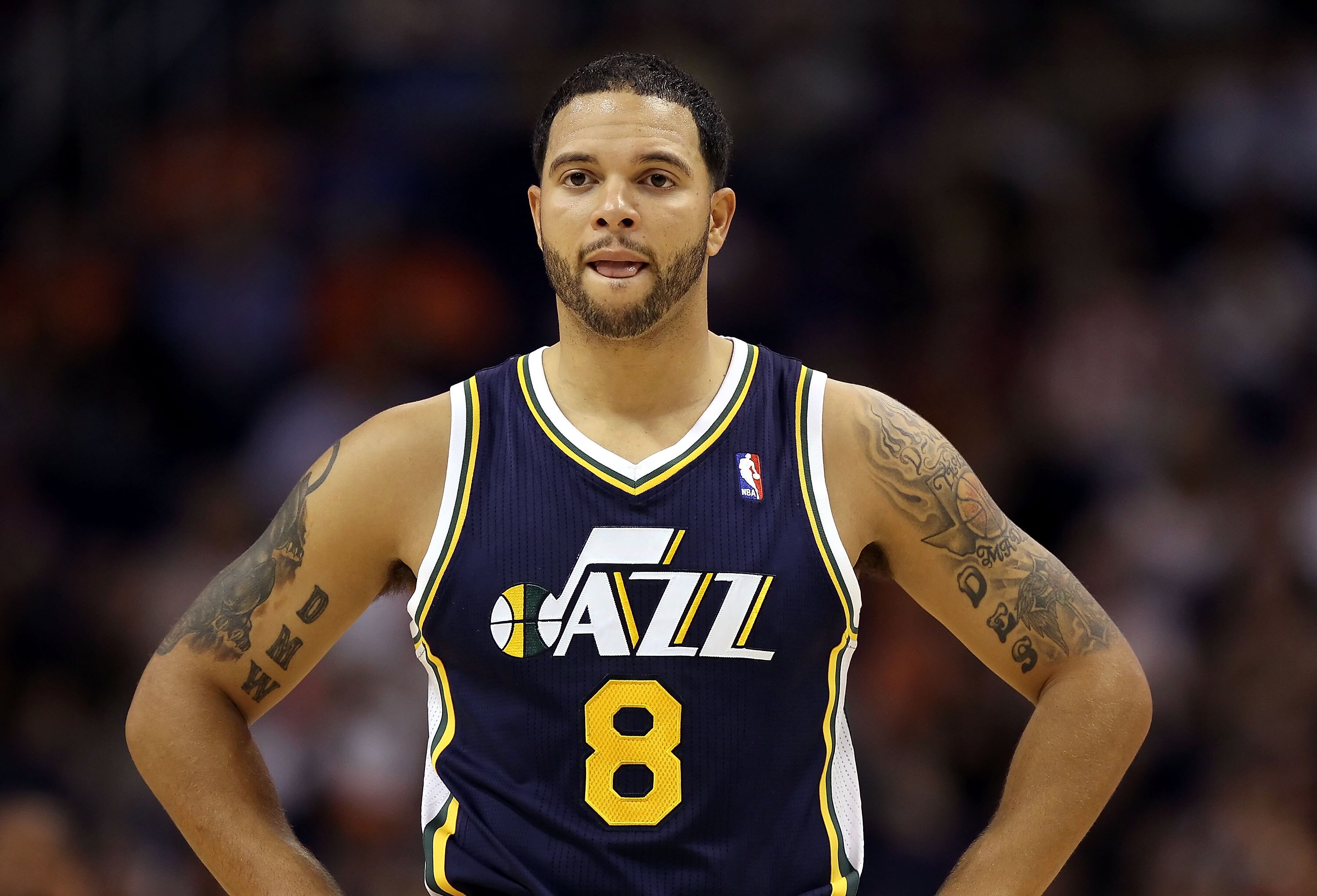 PHOENIX - OCTOBER 12:  Deron Williams #8 of the Utah Jazz in action during the preseason NBA game against the Phoenix Suns at US Airways Center on October 12, 2010 in Phoenix, Arizona. NOTE TO USER: User expressly acknowledges and agrees that, by download