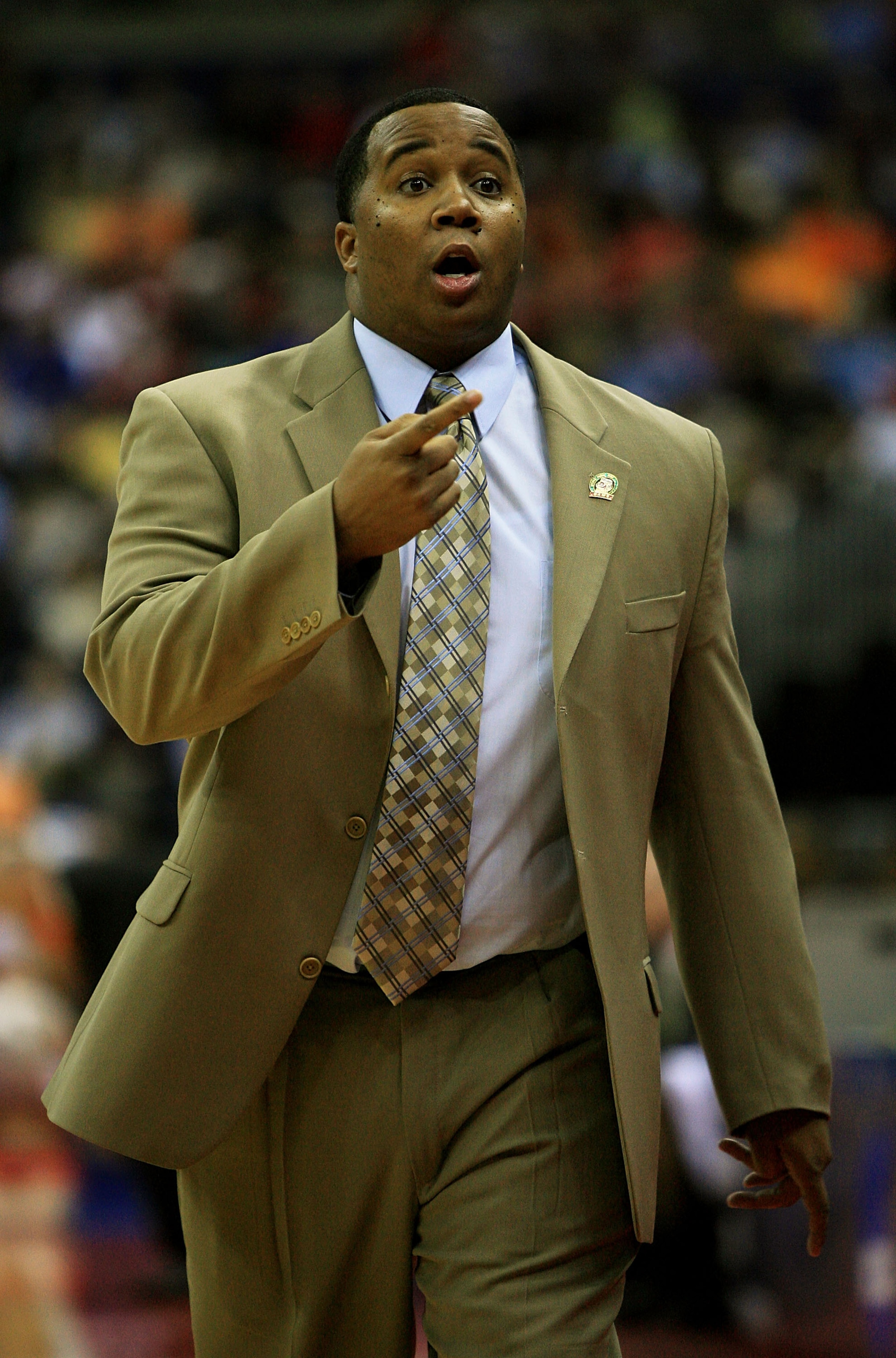 COLUMBUS, OH - MARCH 18:  Head coach Chris Lowery of the Souther Illinois Salukis shouts from the bench during their game against the Virginia Tech Hokies during the second round of the NCAA Men's Basketball Tournament at Nationwide Arena on March 18, 200