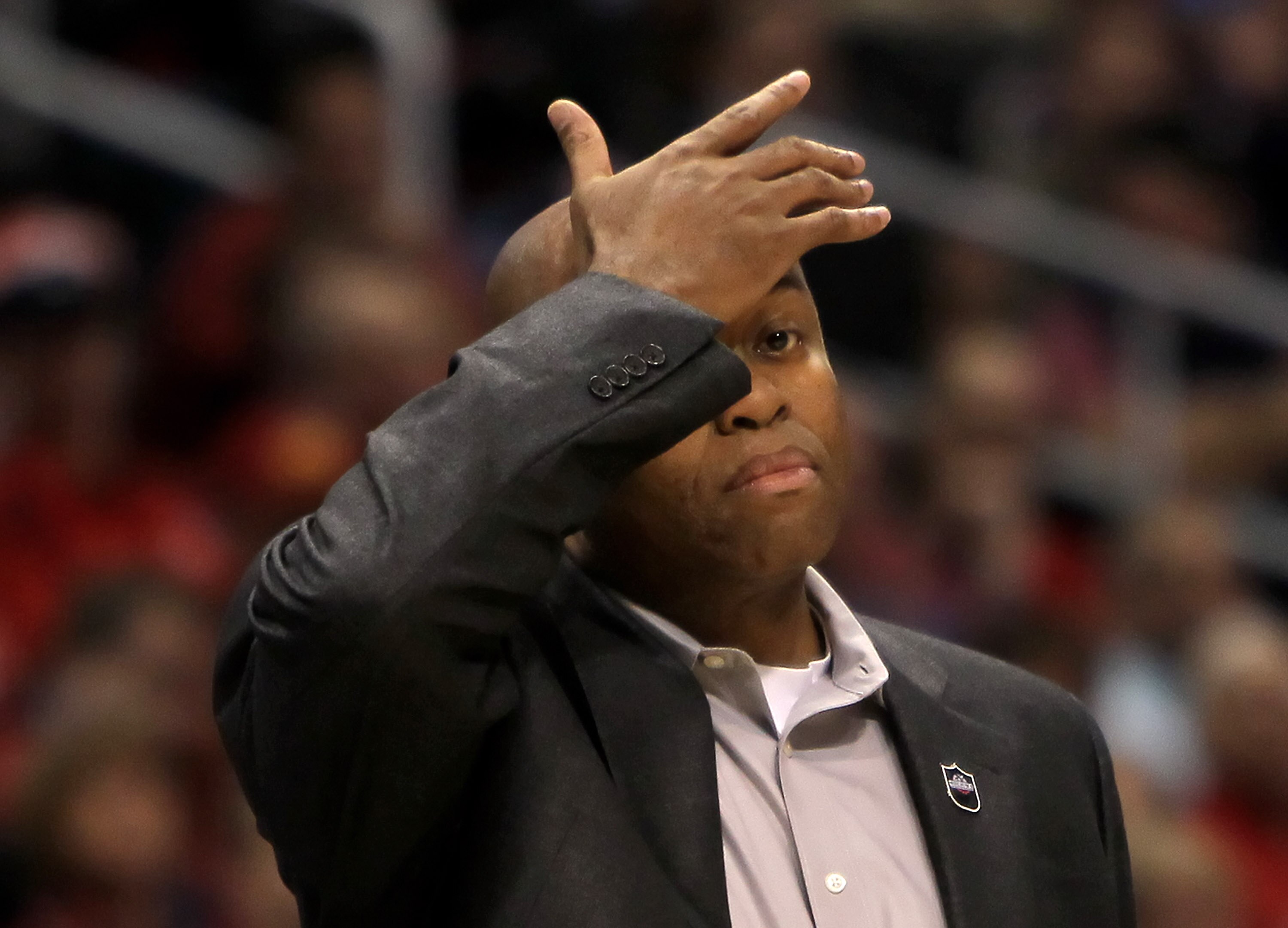 LOS ANGELES, CA - MARCH 11:  Oregon State Beavers head coach Craig Robinson wipes his brow in the first half against the Washington Huskies during the Quarterfinals of the Pac-10 Basketball Tournament at Staples Center on March 11, 2010 in Los Angeles, Ca