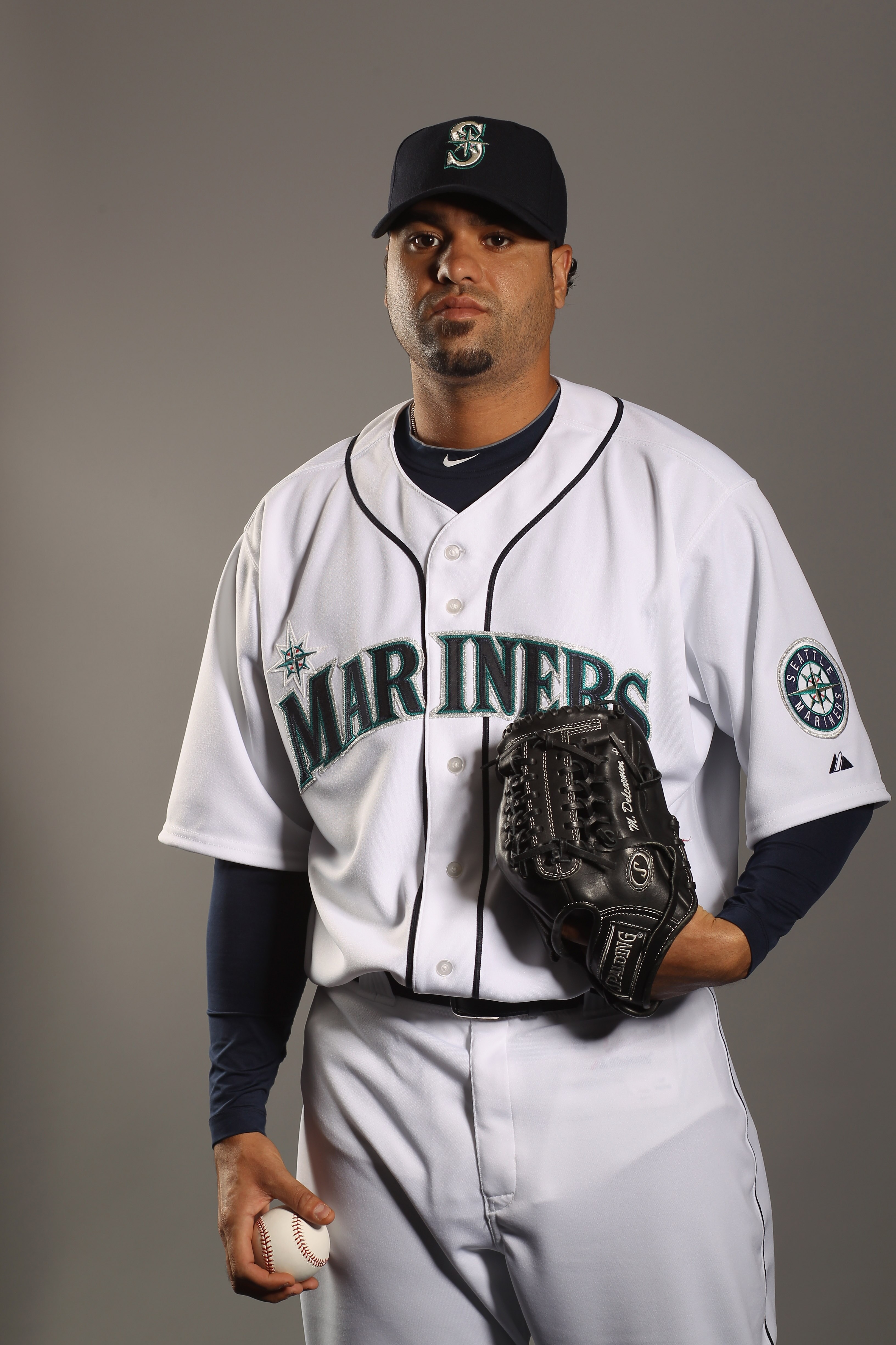 PEORIA, AZ - FEBRUARY 20:  Manny Delcarmen #31 of the Seattle Mariners poses for a portrait at the Peoria Sports Complex on February 20, 2011 in Peoria, Arizona.  (Photo by Ezra Shaw/Getty Images)