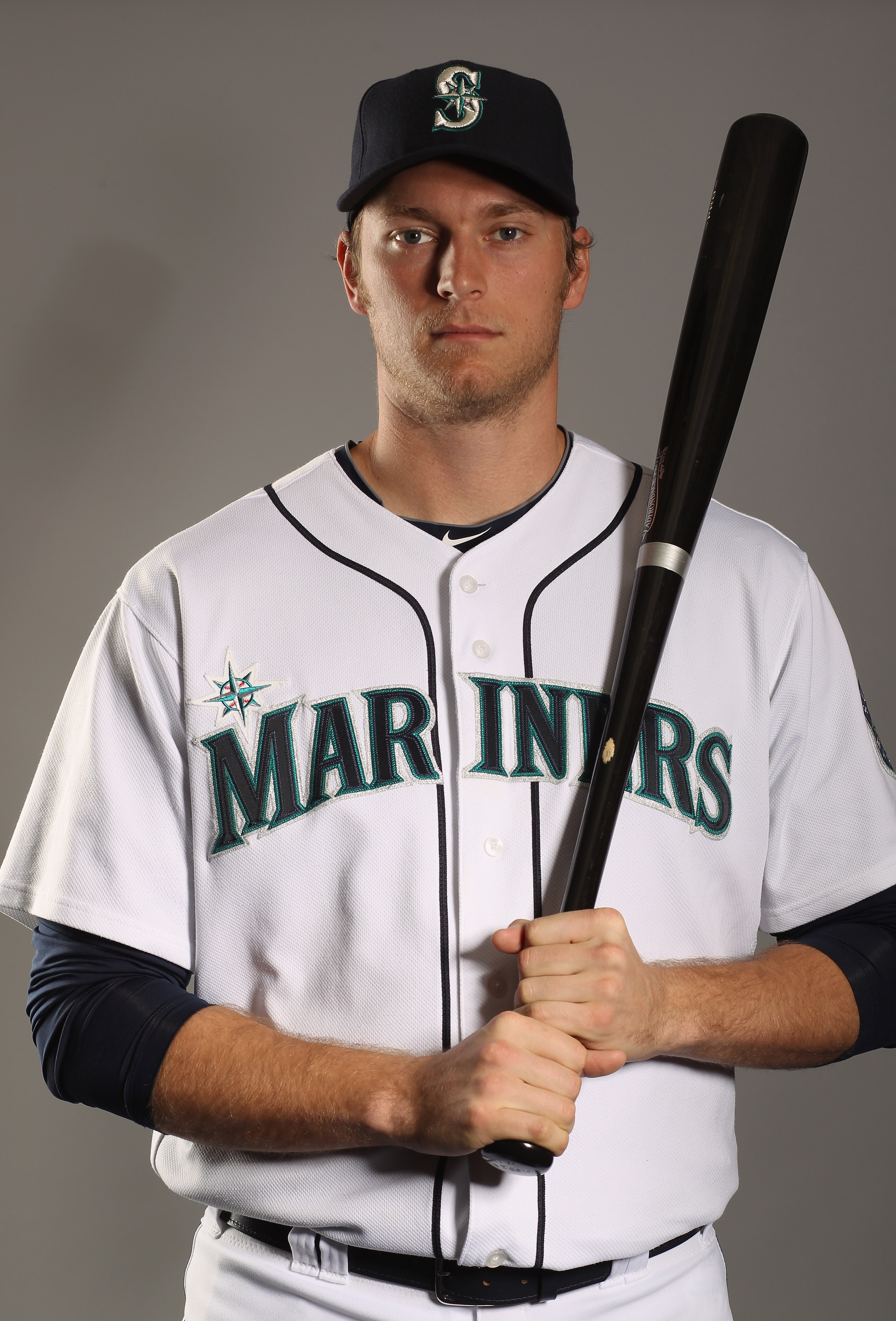 PEORIA, AZ - FEBRUARY 20:  Michael Saunders #55 of the Seattle Mariners poses for a portrait at the Peoria Sports Complex on February 20, 2011 in Peoria, Arizona.  (Photo by Ezra Shaw/Getty Images)