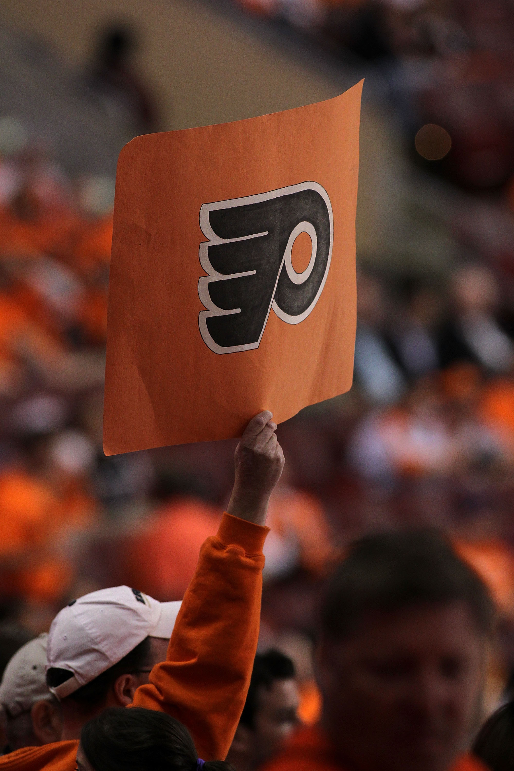 PHILADELPHIA - JUNE 02:  An fan holds up a Flyers logo before Game Three of the 2010 NHL Stanley Cup Final between the Chicago Blackhawks and the Philadelphia Flyers at Wachovia Center on June 2, 2010 in Philadelphia, Pennsylvania.  (Photo by Andre Ringue