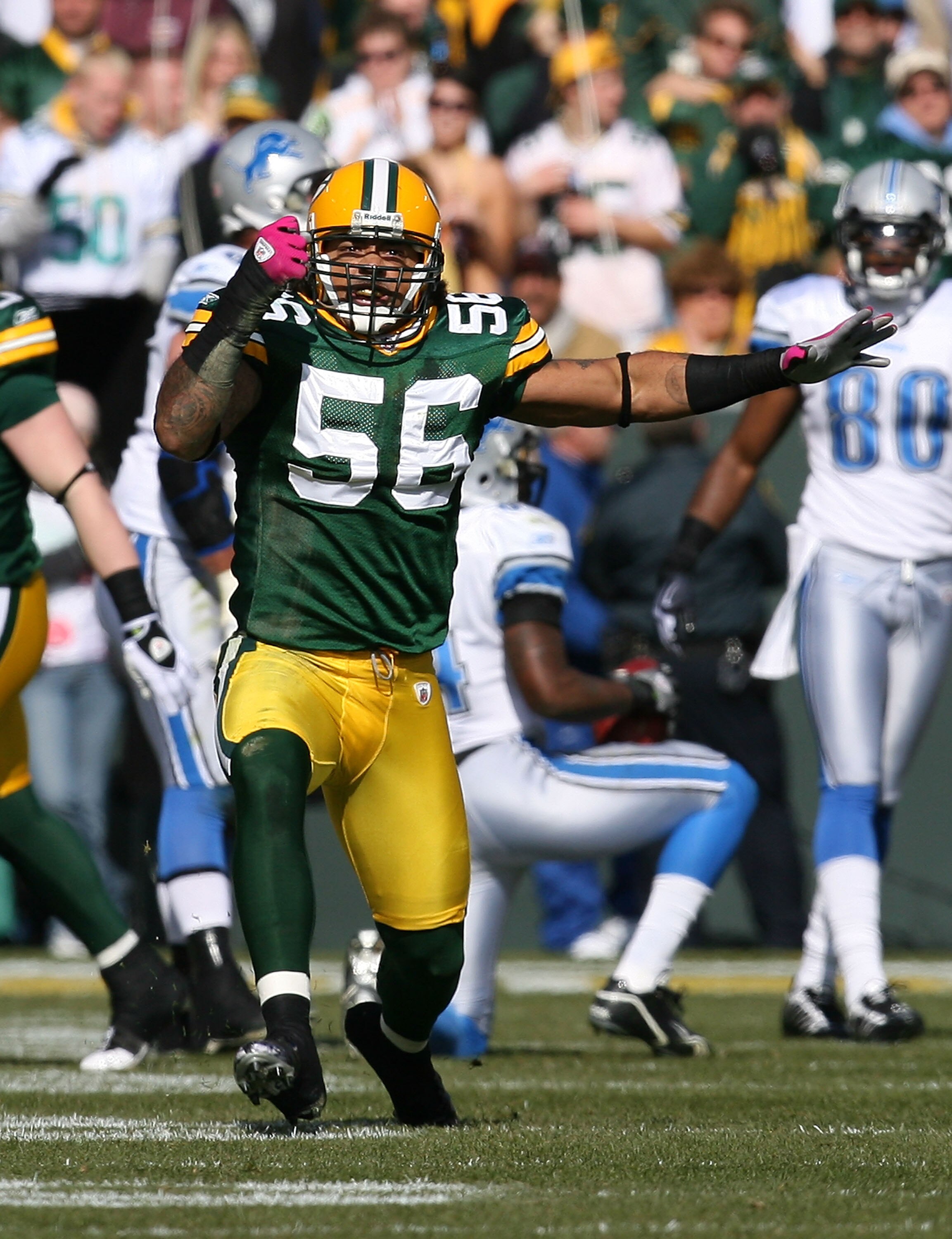GREEN BAY, WI - OCTOBER 18: Nick Barnett #56 of the Green Bay Packers celebrates a defensive stop against the Detroit Lions at Lambeau Field on October 18, 2009 in Green Bay, Wisconsin. The Packers defeated the Lions 26-0. (Photo by Jonathan Daniel/Getty