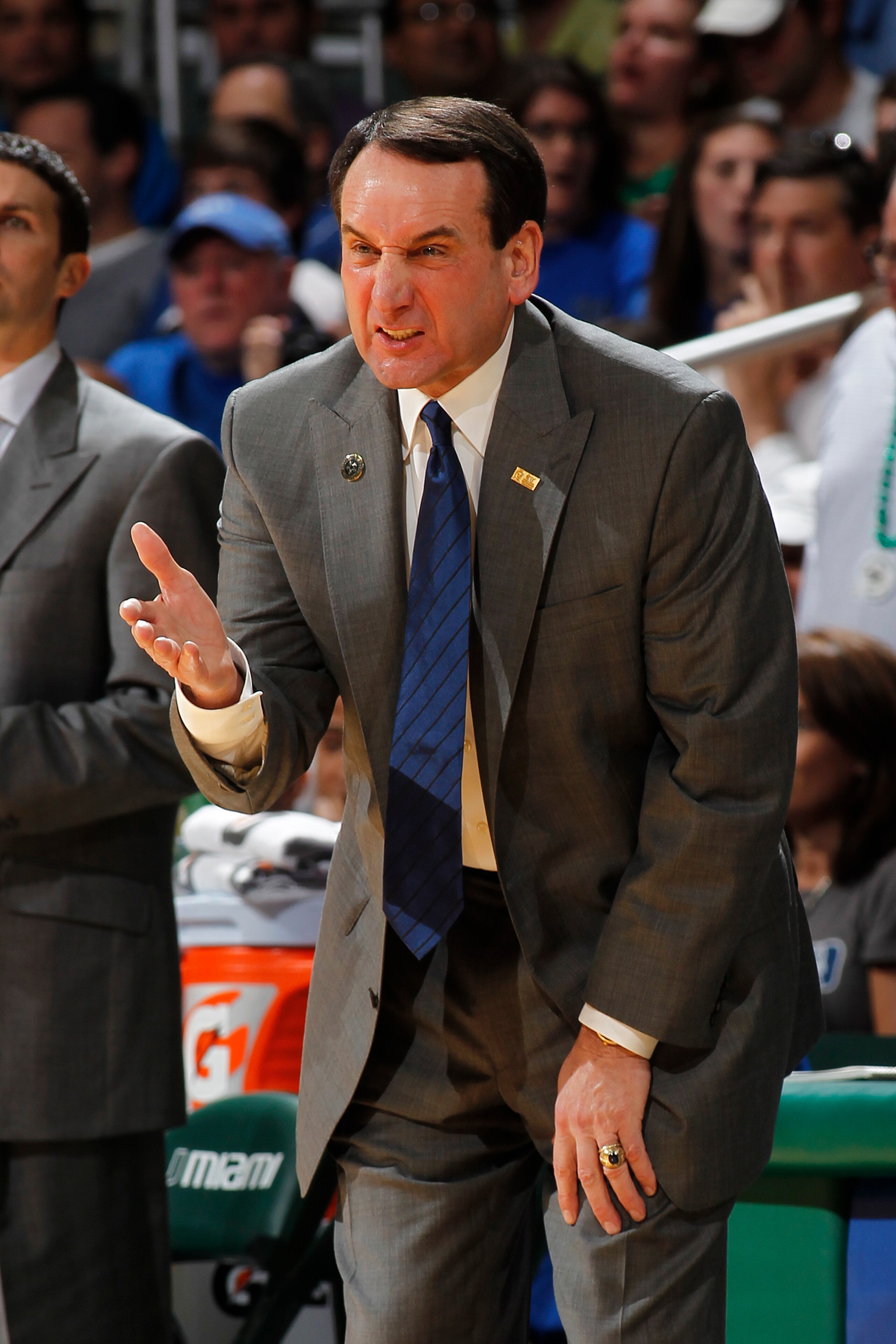 CORAL GABLES, FL - FEBRUARY 13: Head coach Mike Krzyzewski of the Duke Blue Devils reacts to a foul call during first half action against the Miami Hurricanes on February 13, 2011 at the BankUnited Center in Coral Gables, Florida. (Photo by Joel Auerbach/