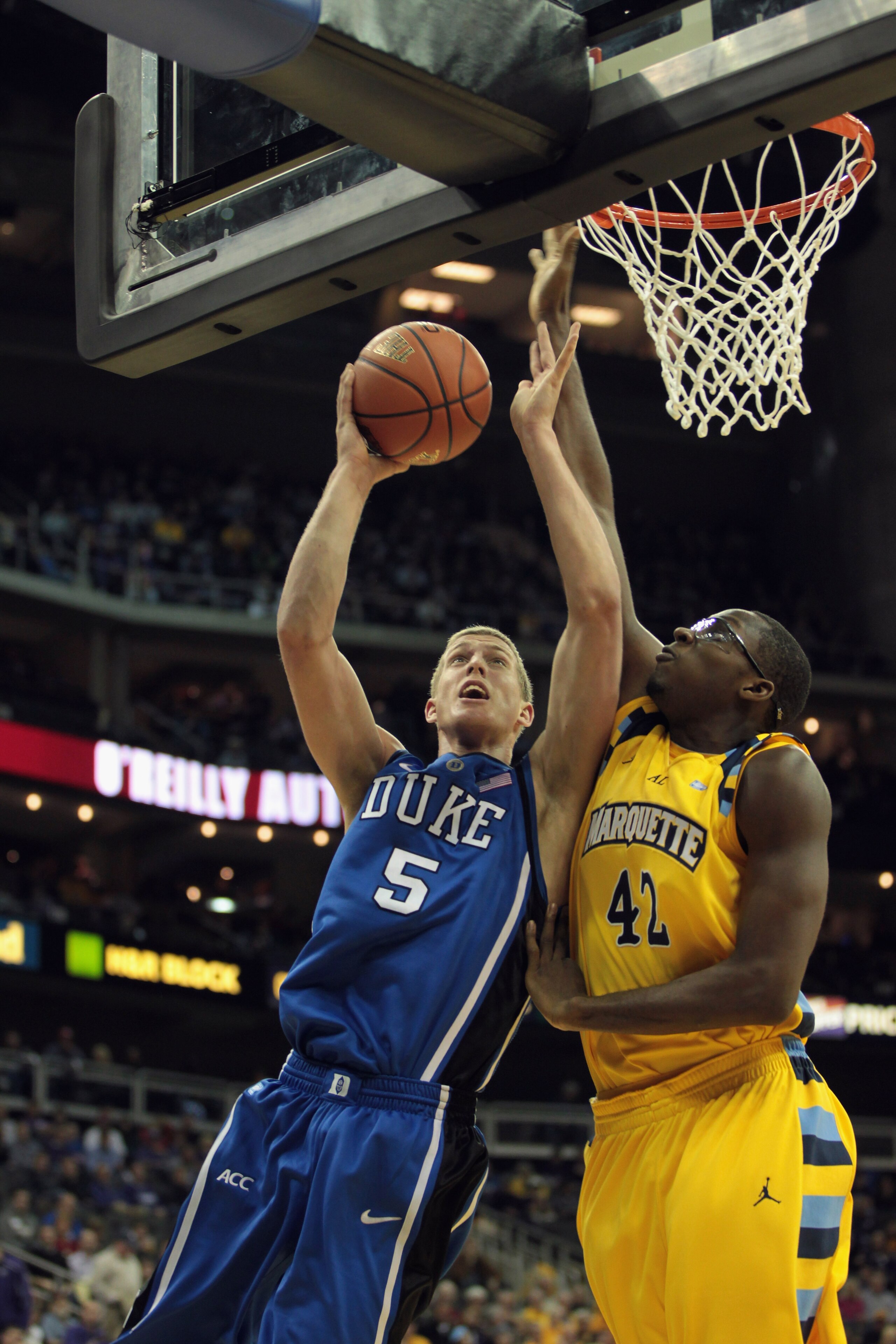 KANSAS CITY, MO - NOVEMBER 22:  Mason Plumlee #5 of the Duke Blue Devils in action during the CBE Classic game against the Marquette Golden Eagles on November 22, 2010 at the Sprint Center in Kansas City, Missouri.  (Photo by Jamie Squire/Getty Images)