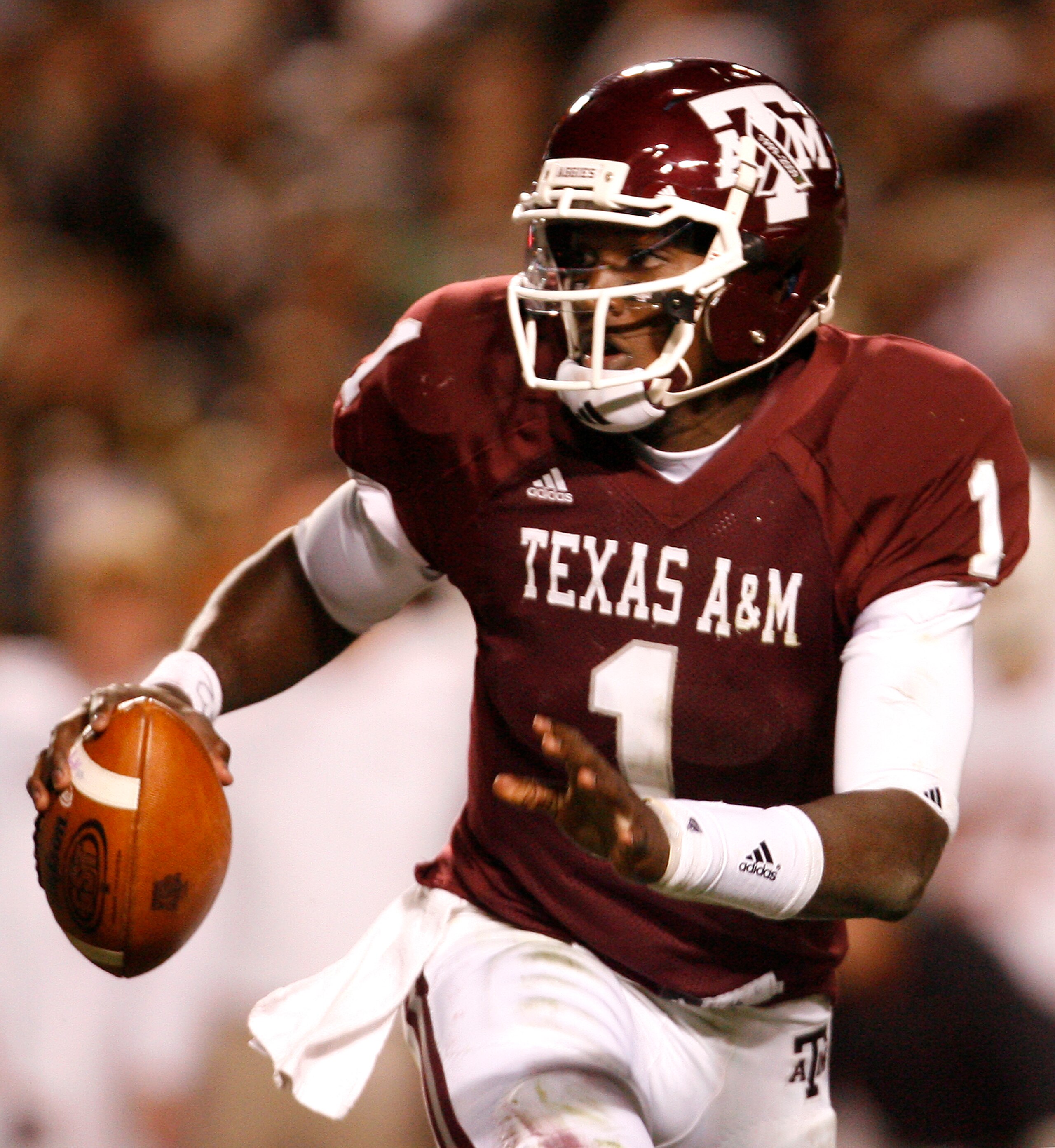 COLLEGE STATION, TX - NOVEMBER 26: Quarterback Jerrod Johnson #1 of the Texas A&M Aggies looks to throw the ball downfield to an open receiver against the Texas Longhorns in the second half at Kyle Field on November 26, 2009 in College Station, Texas. The COLLEGE STATION, TX - NOVEMBER 26: Quarterback Jerrod Johnson #1 of the Texas A&M Aggies looks to throw the ball downfield to an open receiver against the Texas Longhorns in the second half at Kyle Field on November 26, 2009 in College Station, Texas. The