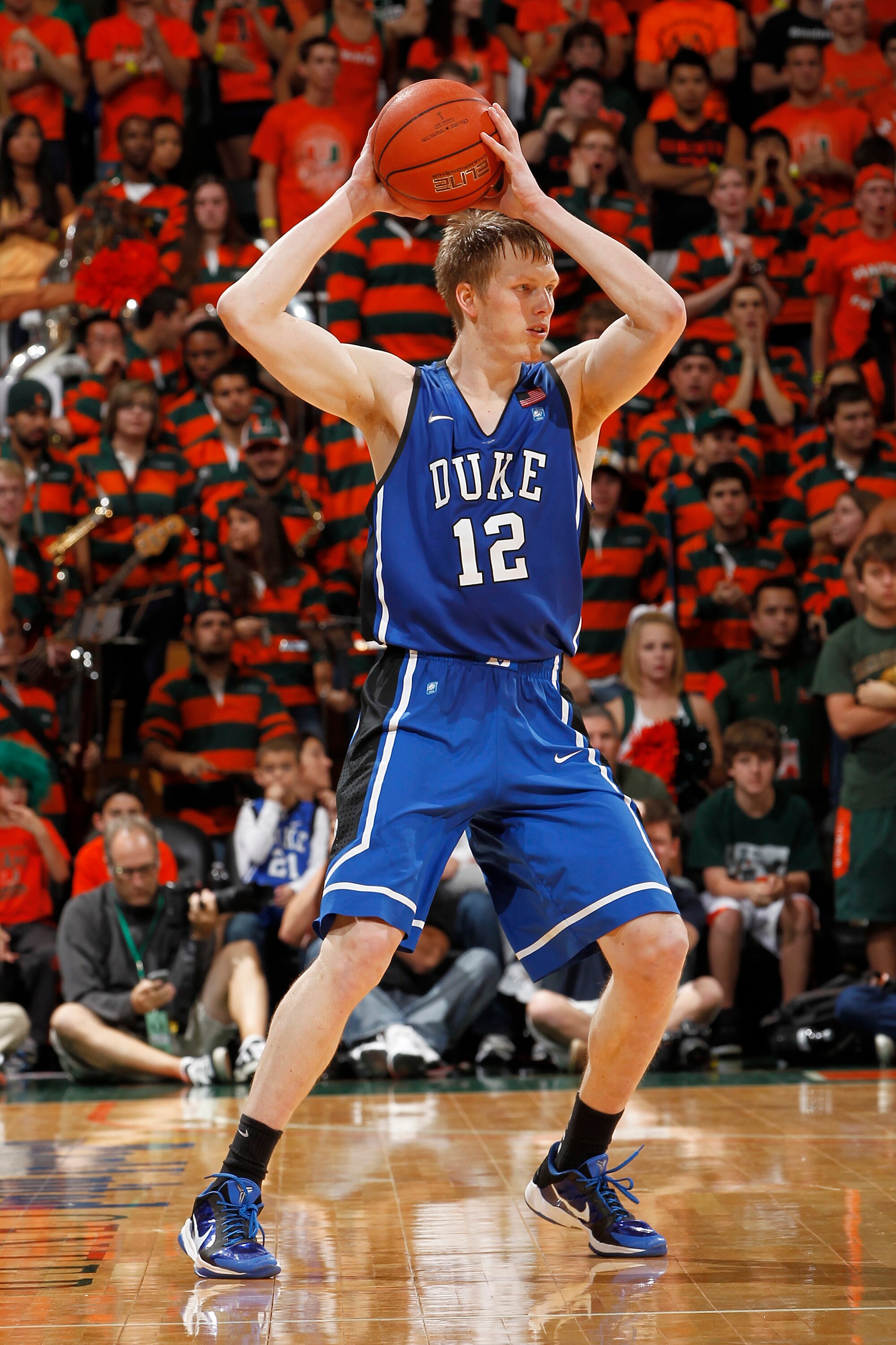 CORAL GABLES, FL - FEBRUARY 13: Kyle Singler #12 of the Duke Blue Devils passes the ball against the Miami Hurricanes on February 13, 2011 at the BankUnited Center in Coral Gables, Florida. (Photo by Joel Auerbach/Getty Images)