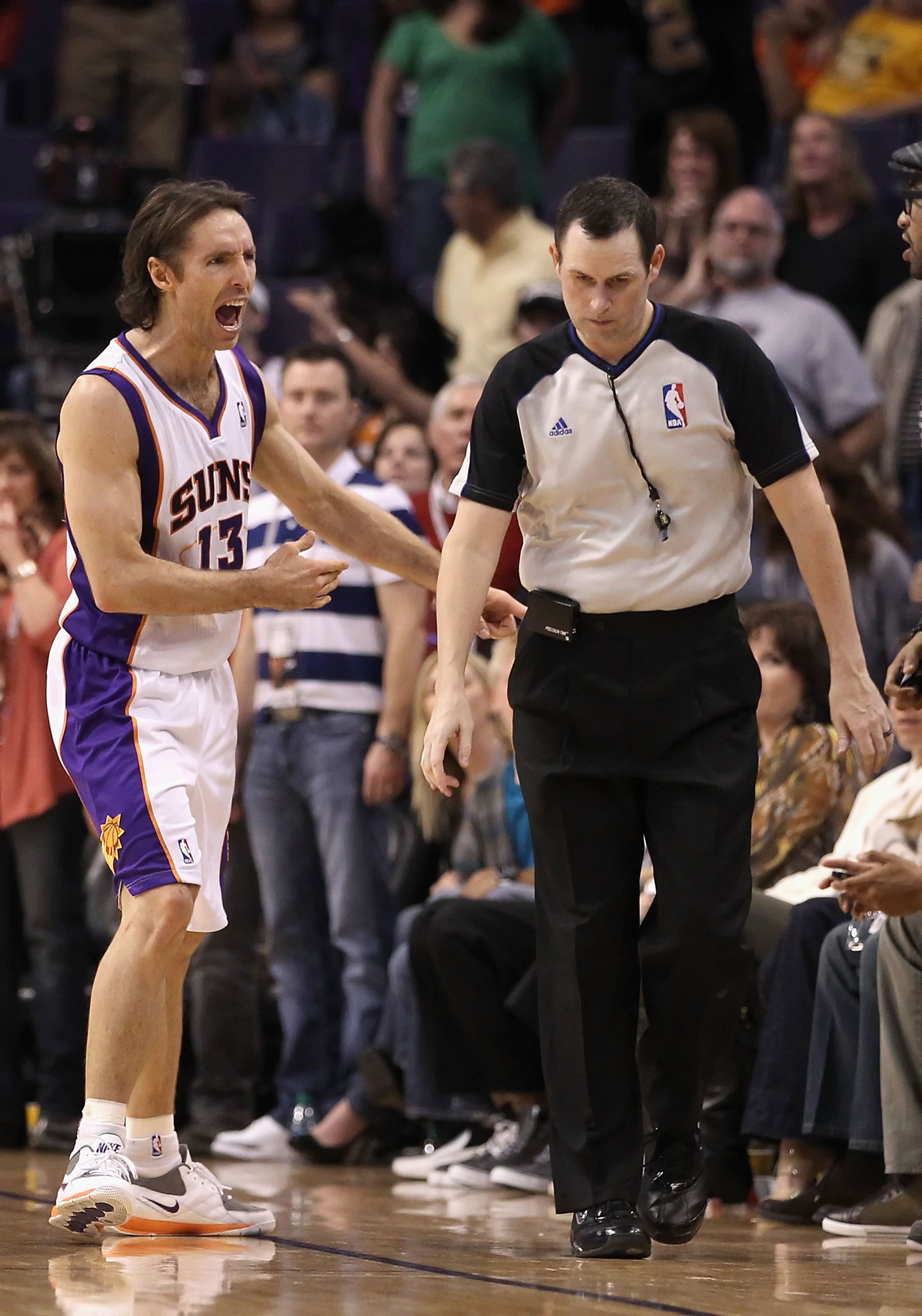 PHOENIX, AZ - JANUARY 30:  Steve Nash #13 of the Phoenix Suns reacts to a non call by the referee late in the fourth quarter of the NBA game against  the New Orleans Hornets at US Airways Center on January 30, 2011 in Phoenix, Arizona. The Suns defeated t