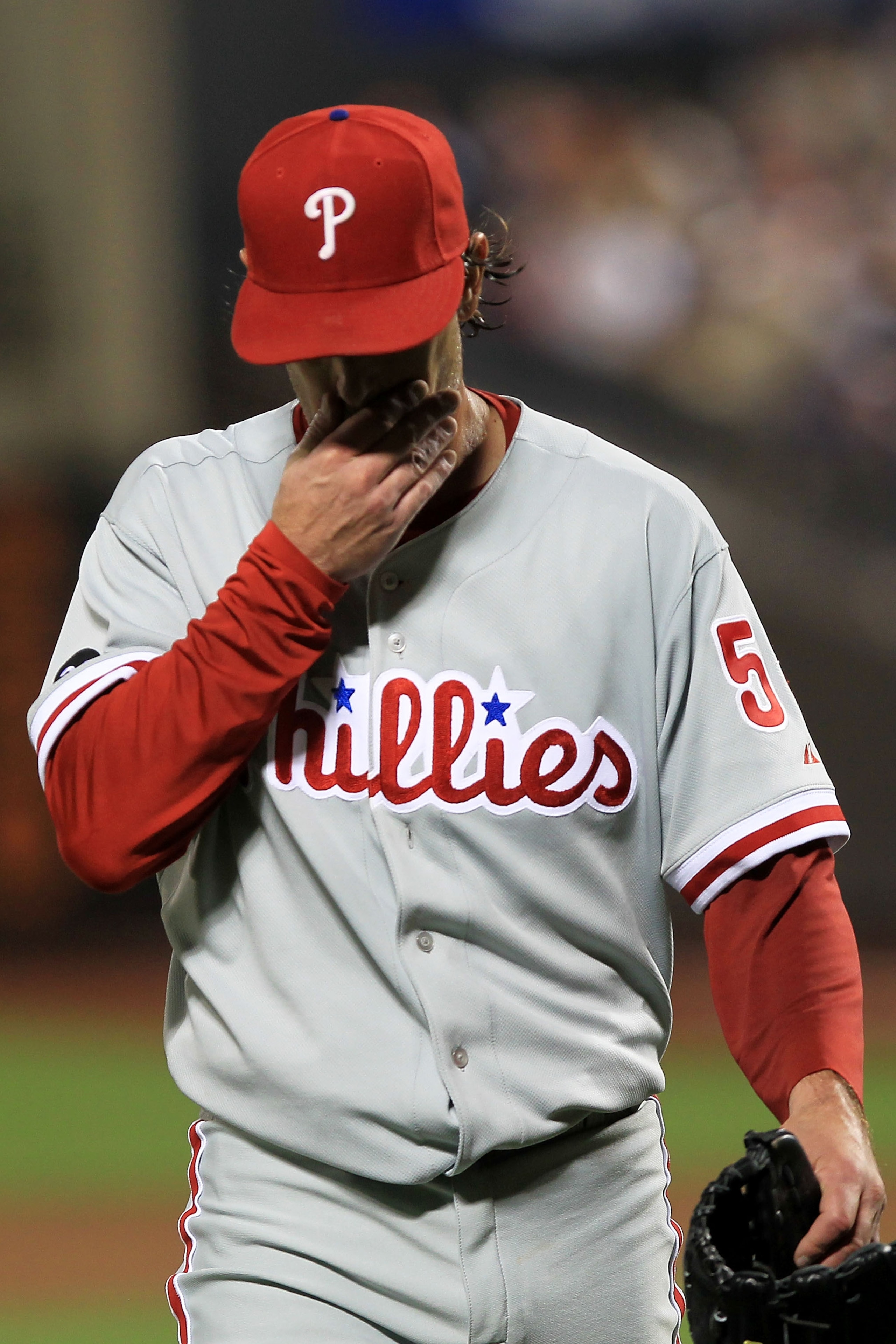 NEW YORK - MAY 25: Jamie Moyer #52 of the Philadelphia Phillies walks back to the dugout in the 5th inning against the New York Mets on May 25, 2010 at Citi Field in the Flushing neighborhood of the Queens borough of New York City.  (Photo by Chris McGrat