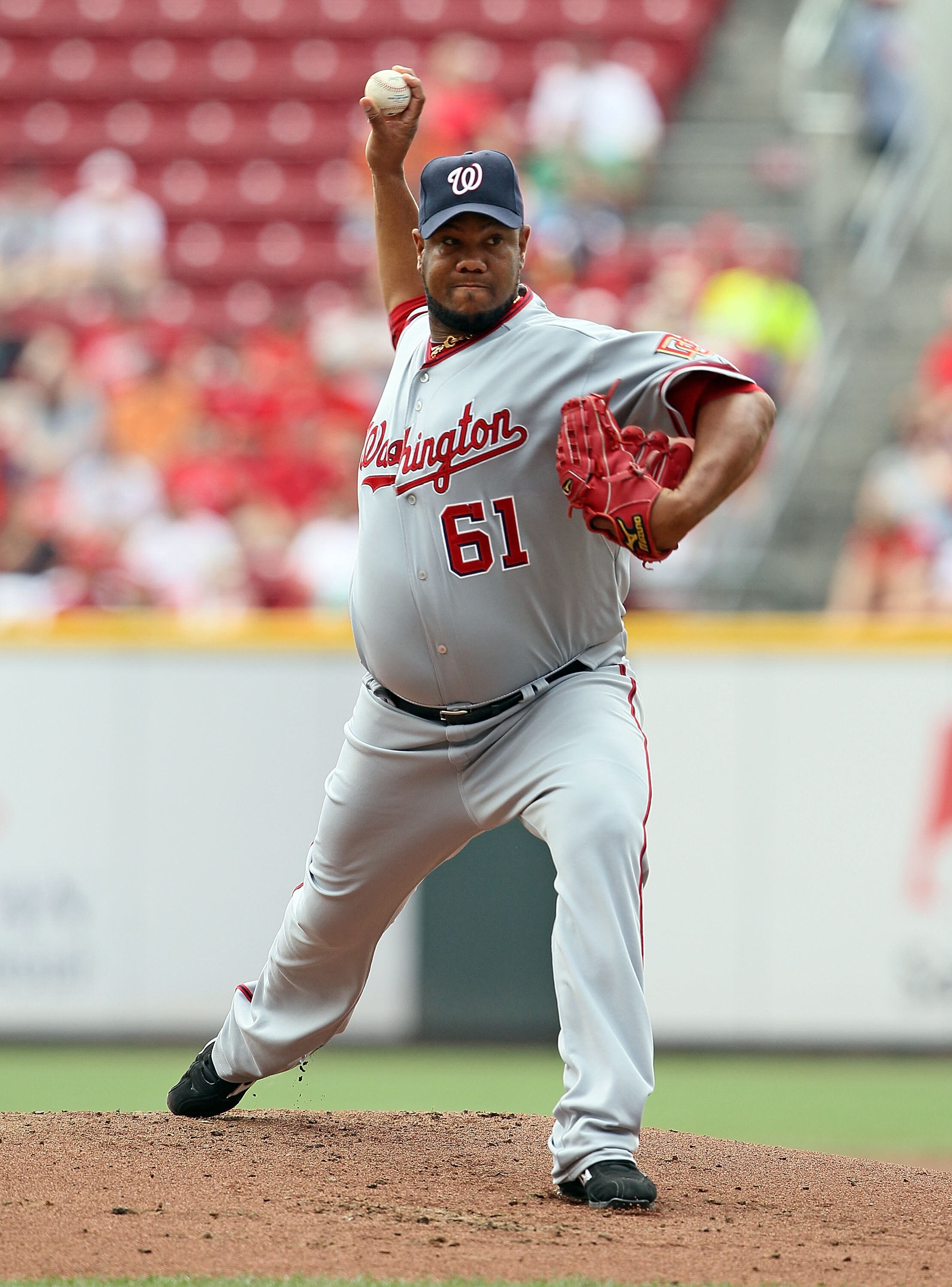 CINCINNATI - JULY 22:  Livan Hernandez #61 of the Washington Nationals throws a pitch during the game against the Cincinnati Reds at Great American Ball Park on July 22, 2010 in Cincinnati, Ohio.  (Photo by Andy Lyons/Getty Images)