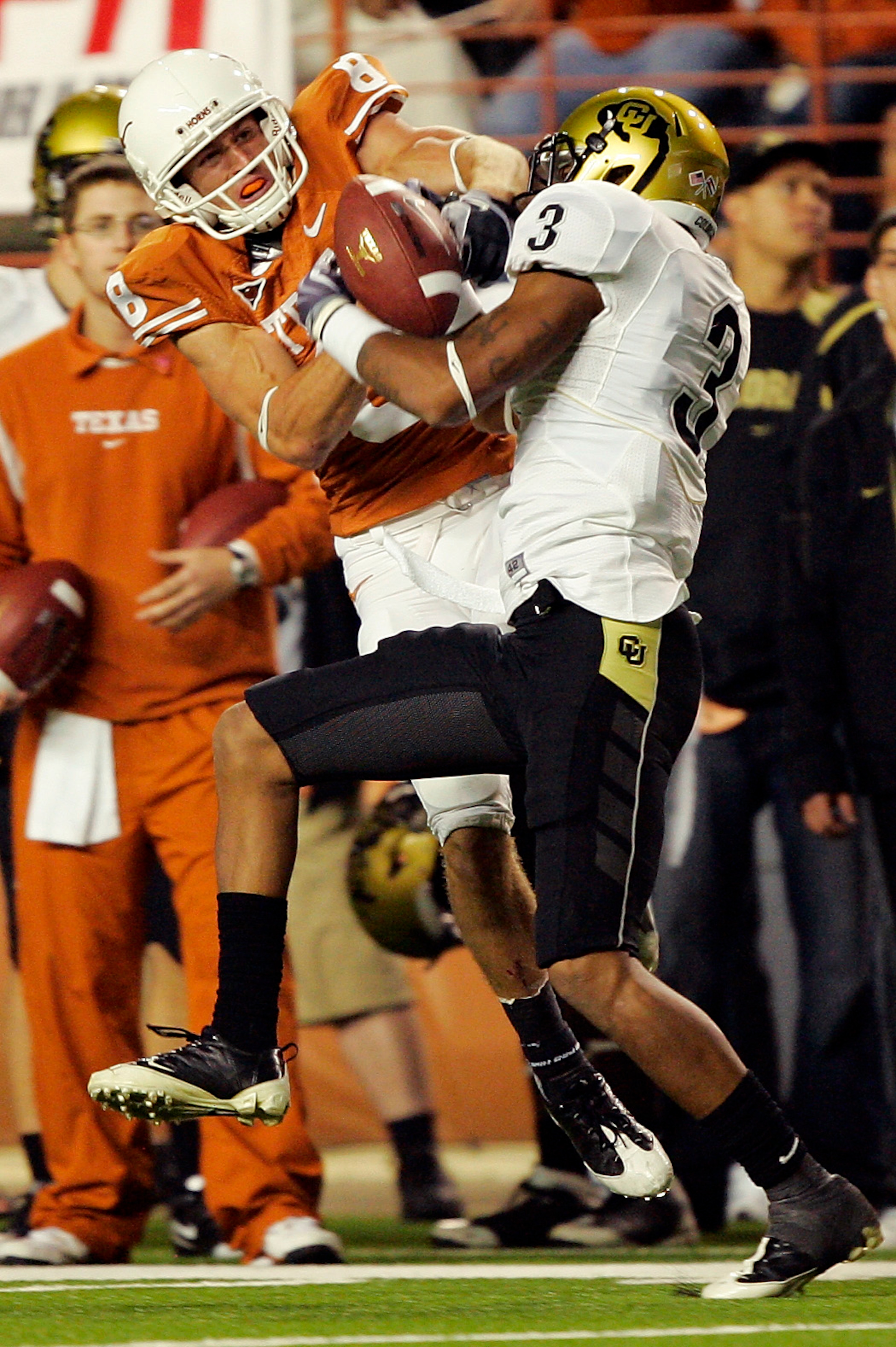 AUSTIN, TX - OCTOBER 10: Jordan Shipley #8 of the Texas Longhorns wrestles for control of the ball with cornerback Jimmy Smith #3 of the Colorado Buffaloes for an incomplete pass on October 10, 2009 at Darrell K Royal-Texas Memorial Stadium in Austin, Tex AUSTIN, TX - OCTOBER 10: Jordan Shipley #8 of the Texas Longhorns wrestles for control of the ball with cornerback Jimmy Smith #3 of the Colorado Buffaloes for an incomplete pass on October 10, 2009 at Darrell K Royal-Texas Memorial Stadium in Austin, Tex