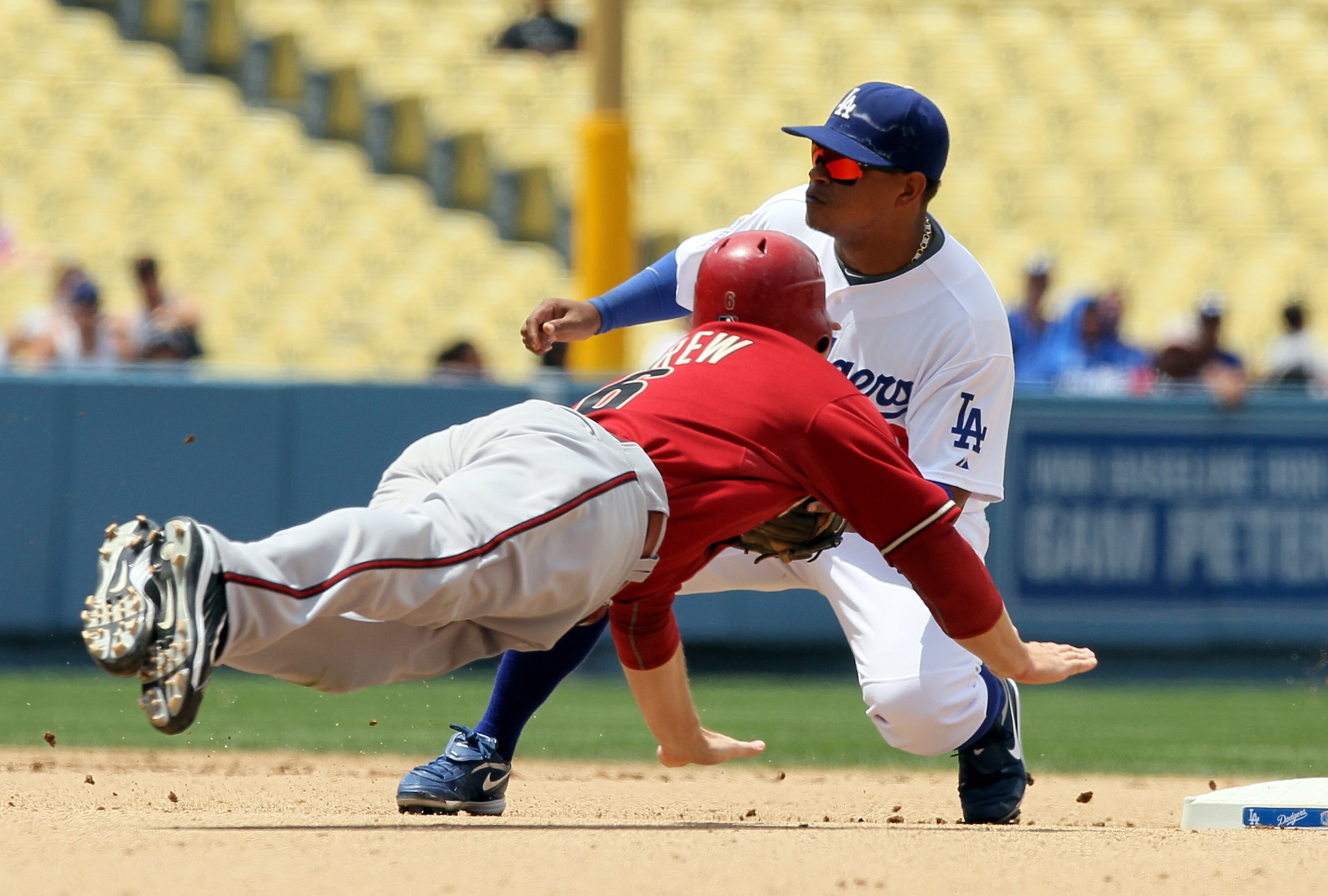LOS ANGELES, CA - JUNE 02:  Stephen Drew #6 of the Arizona Diamondbacks is tagged out by Ronnie Belliard #3 of the Los Angeles Dodgers while trying to steal second base in the seventh inning at Dodger Stadium on June 2, 2010 in Los Angeles, California.  T