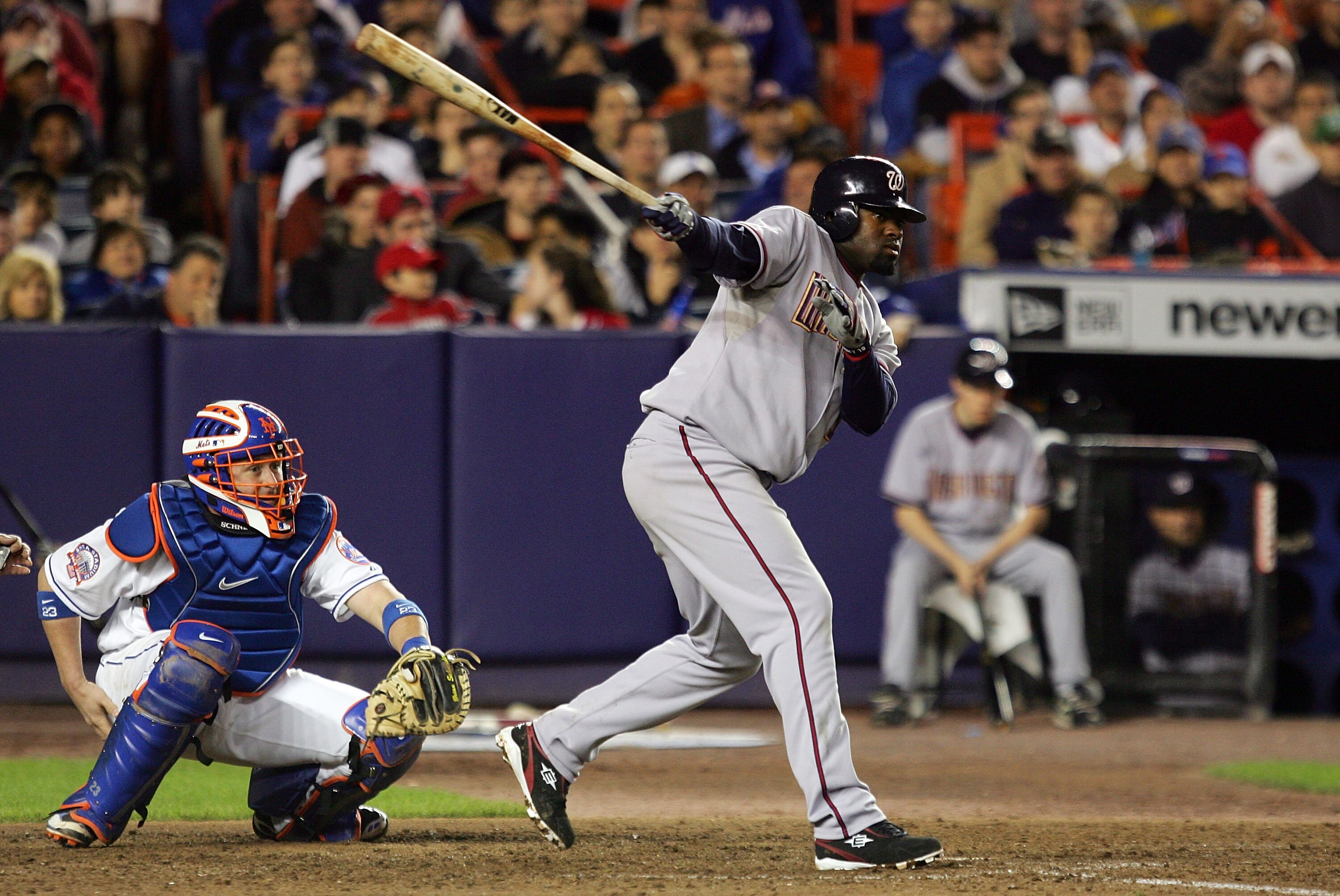 NEW YORK - MAY 14:  Cristian Guzman #15 of the Washington Nationals hits a two run single in the seventh inning against the New York Mets on May 14, 2008 at Shea Stadium in the Flushing neighborhood of the Queens borough of New York City.  (Photo by Jim M