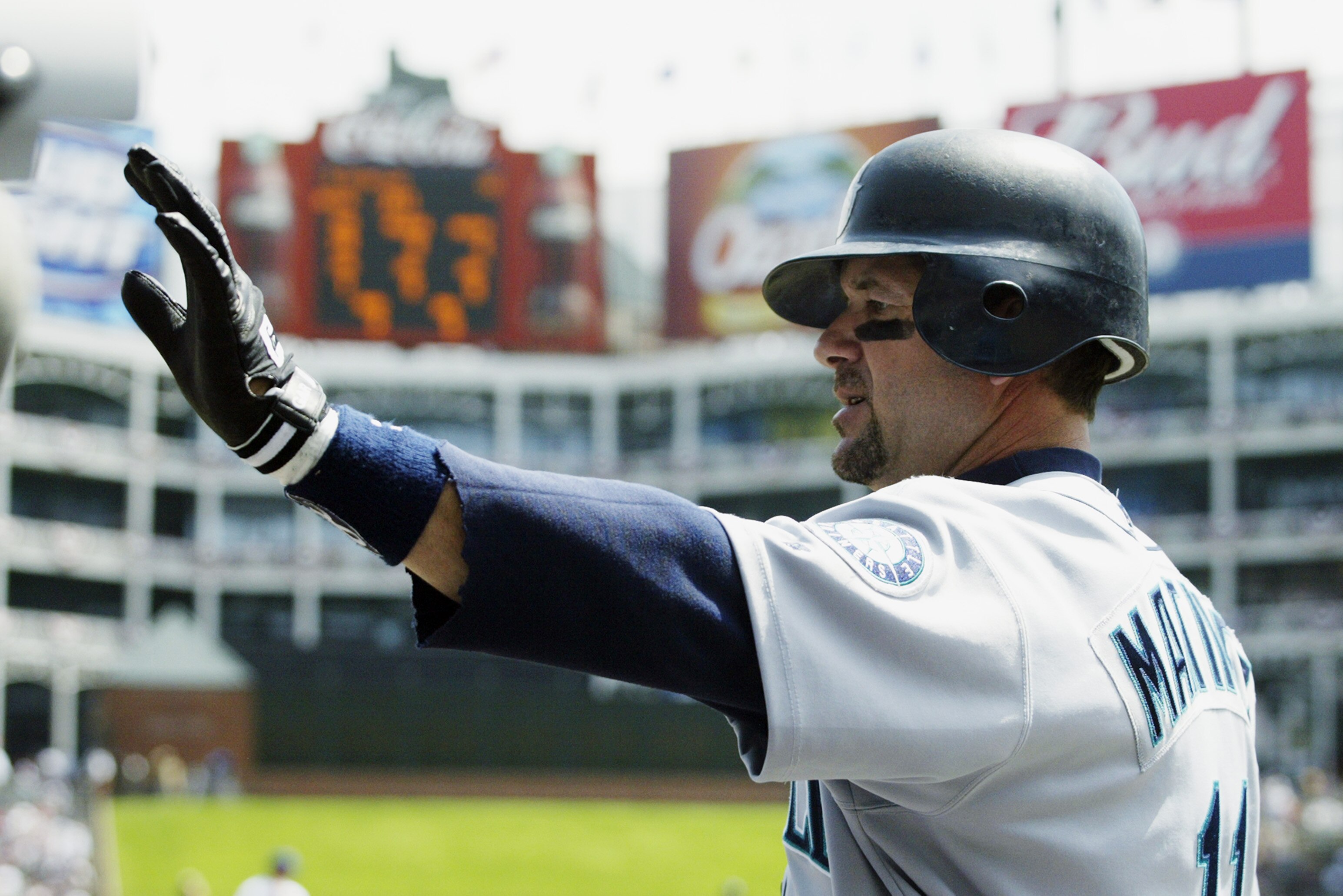 ARLINGTON, TX - APRIL 6:  Edgar Martinez #11 of the Seattle Mariners gets ready to bat during the game against the Texas Rangers at the Ballpark in Arlington on April 6, 2003 in Arlington, Texas.  The Mariners defeated the Rangers 11-2.  (Photo by Ronald