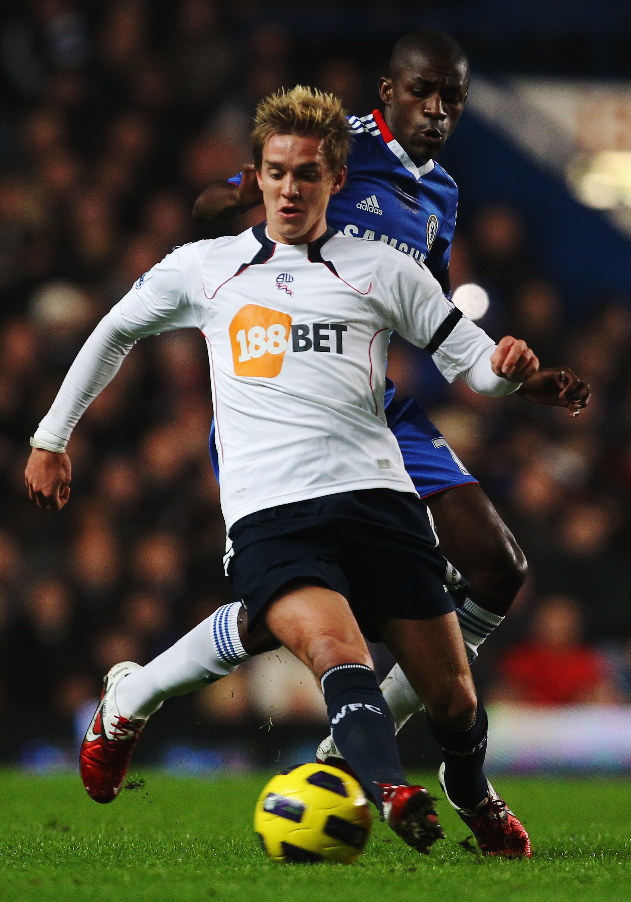 LONDON, UNITED KINGDOM - DECEMBER 29:  Stuart Holden (L) of Bolton Wanderers holds off the challenge of Ramires (R) of Chelsea during the Barclays Premier League match between Chelsea and Bolton Wanderers at Stamford Bridge on December 29, 2010 in London,