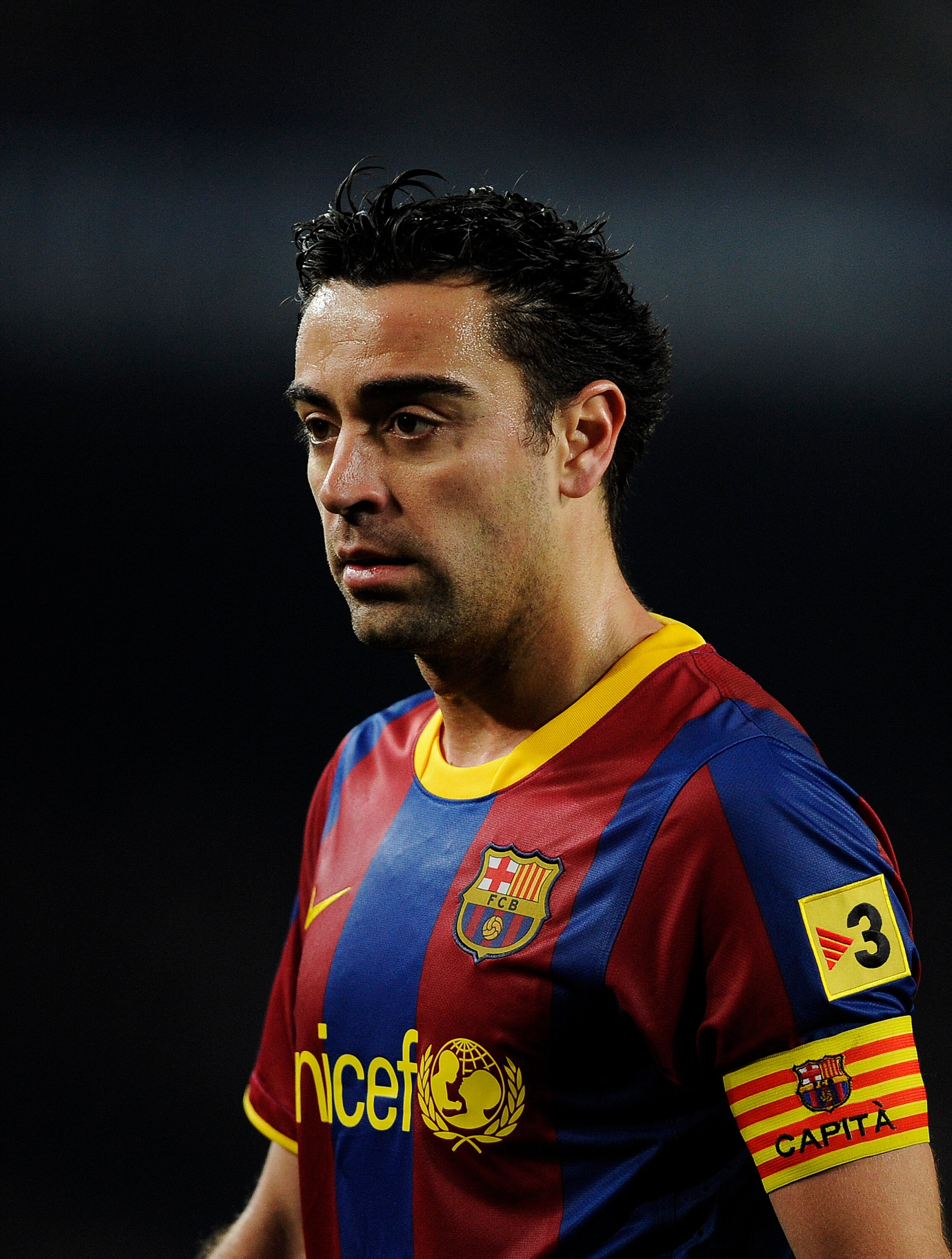 BARCELONA, SPAIN - JANUARY 26:   Xavi Hernandez of Barcelona looks on during the Copa del Rey Semi Final First Leg match between Barcelona and Almeria at Camp Nou on January 26, 2011 in Barcelona, Spain. Barcelona won 5-0.  (Photo by David Ramos/Getty Ima