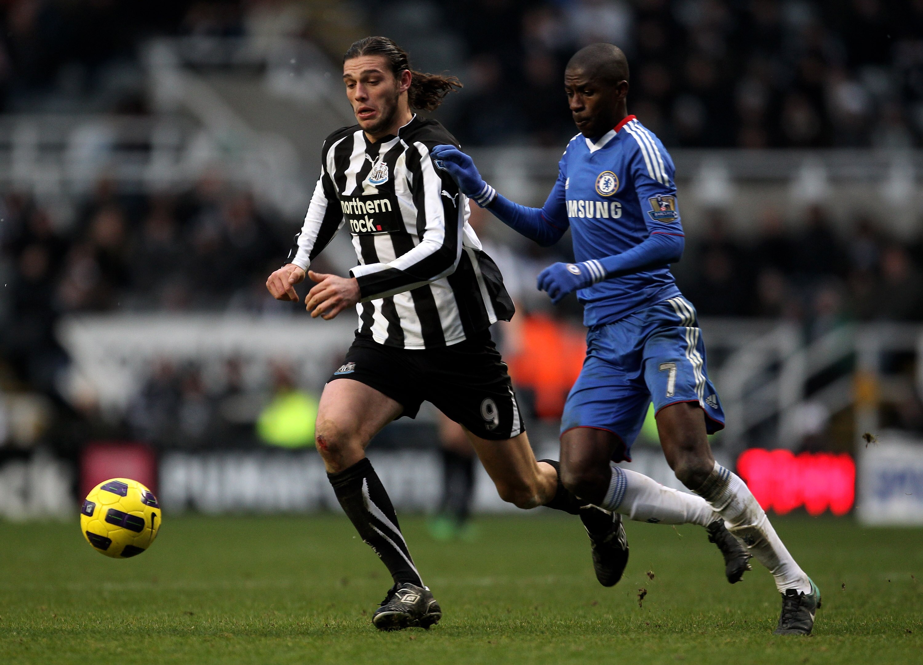 NEWCASTLE UPON TYNE, ENGLAND - NOVEMBER 28:  Andy Carroll of Newcastle United competes with Ramires of Chelsea during the Barclays Premier League match between Newcastle United and Chelsea at St James' Park on November 28, 2010 in Newcastle, England.  (Ph