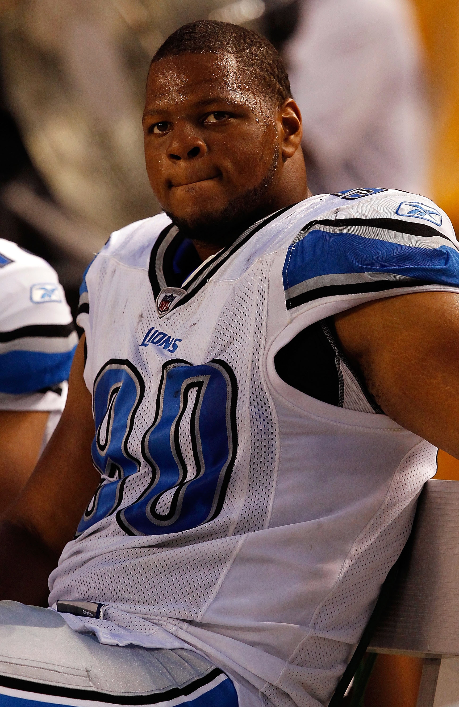 PITTSBURGH - AUGUST 14:  Number 2 overall pick in the NFL Draft, Ndamukong Suh #90 of the Detroit Lions watches the game from the bench during the preseason game against the Pittsburgh Steelers on August 14, 2010 at Heinz Field in Pittsburgh, Pennsylvania