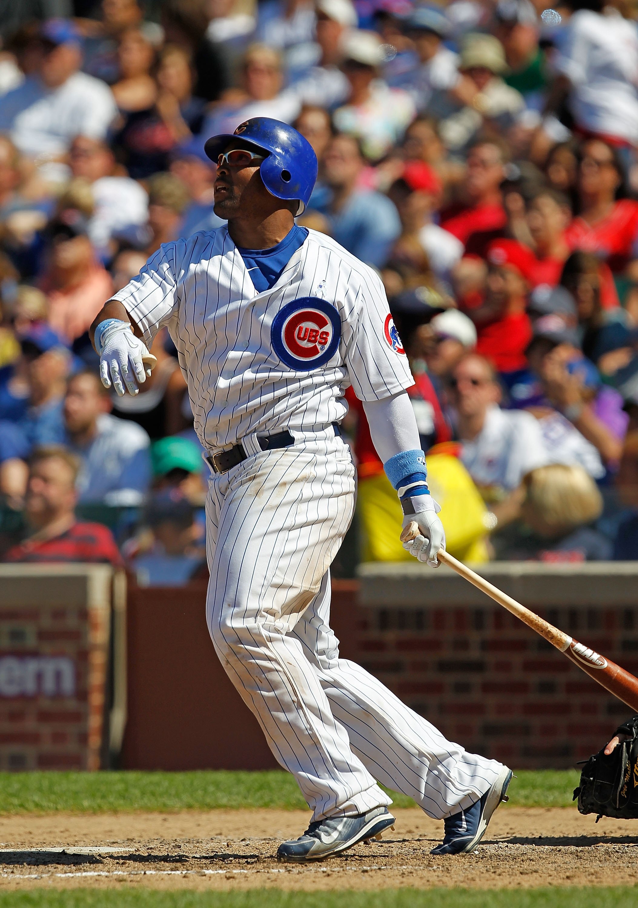 CHICAGO - JUNE 20: Marlon Byrd #24 of the Chicago Cubs hits the ball against the Los Angeles Angels of Anaheim at Wrigley Field on June 20, 2010 in Chicago, Illinois. The Cubs defeated the Angels 12-1. (Photo by Jonathan Daniel/Getty Images)