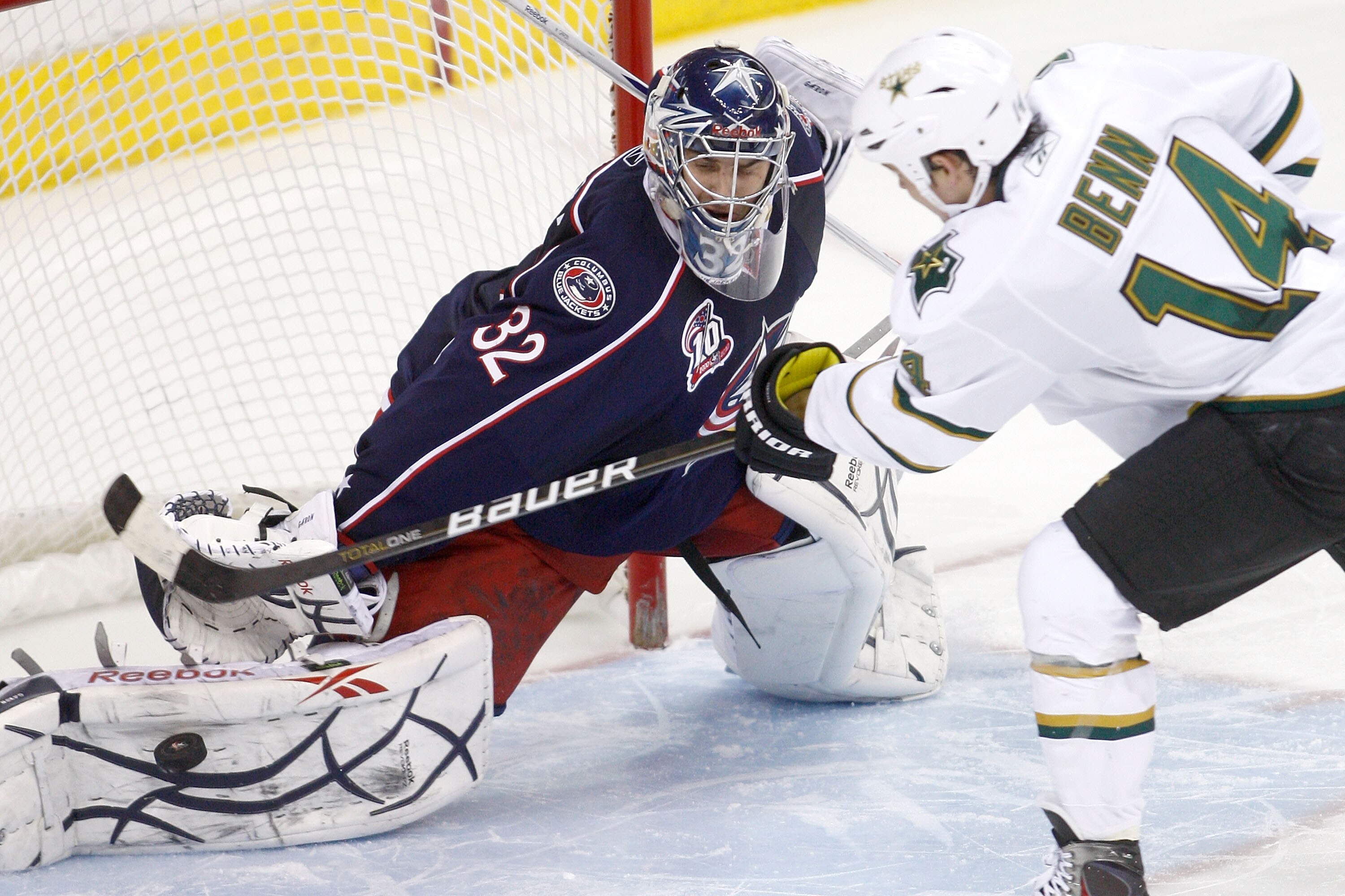 COLUMBUS, OH - DECEMBER 6:  Goaltender Mathieu Garon #32 of the Columbus Blue Jackets blocks a shot from Jamie Benn #14 of the Dallas Stars in a shootout, sealing a victory for Columbus on December 6, 2010 at Nationwide Arena in Columbus, Ohio.  Columbus