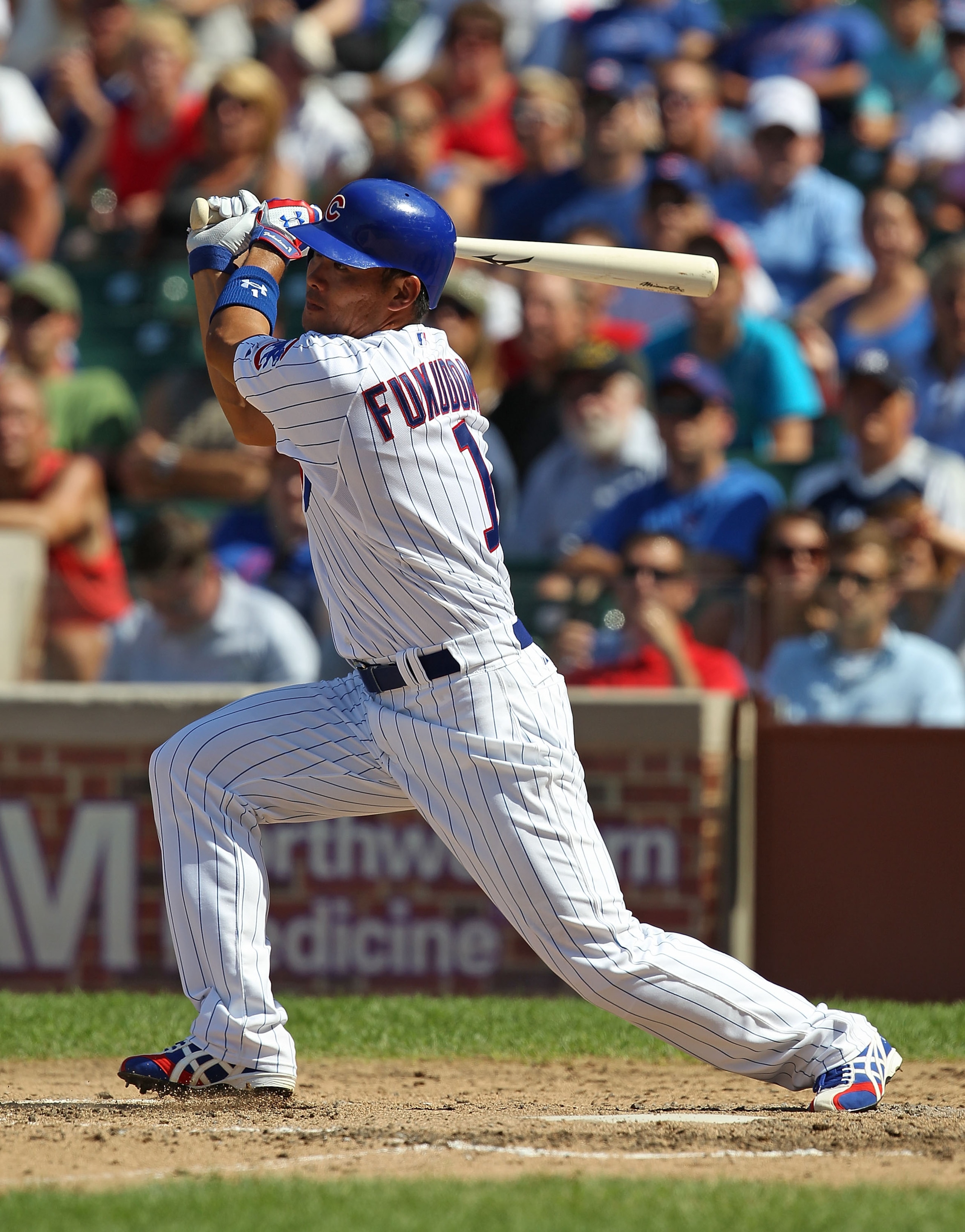 CHICAGO - JULY 21: Kosuke Fukudome #1 of the Chicago Cubs hit the ball against the Houston Astros at Wrigley Field on July 21, 2010 in Chicago, Illinois. The Astros defeated the Cubs 4-3 in 12 innings. (Photo by Jonathan Daniel/Getty Images) CHICAGO - JULY 21: Kosuke Fukudome #1 of the Chicago Cubs hit the ball against the Houston Astros at Wrigley Field on July 21, 2010 in Chicago, Illinois. The Astros defeated the Cubs 4-3 in 12 innings. (Photo by Jonathan Daniel/Getty Images)