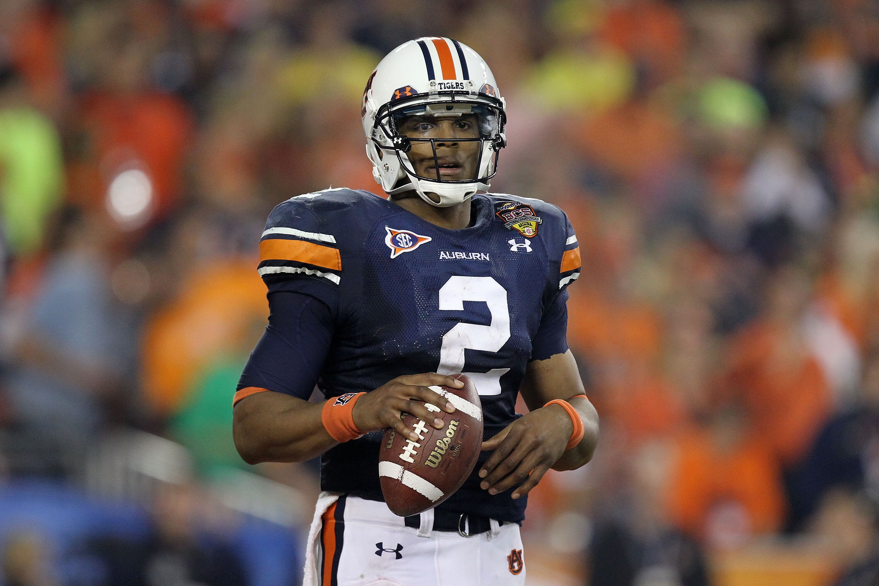GLENDALE, AZ - JANUARY 10:  Cameron Newton #2 of the Auburn Tigers looks on against the Oregon Ducks during the Tostitos BCS National Championship Game at University of Phoenix Stadium on January 10, 2011 in Glendale, Arizona.  (Photo by Ronald Martinez/G