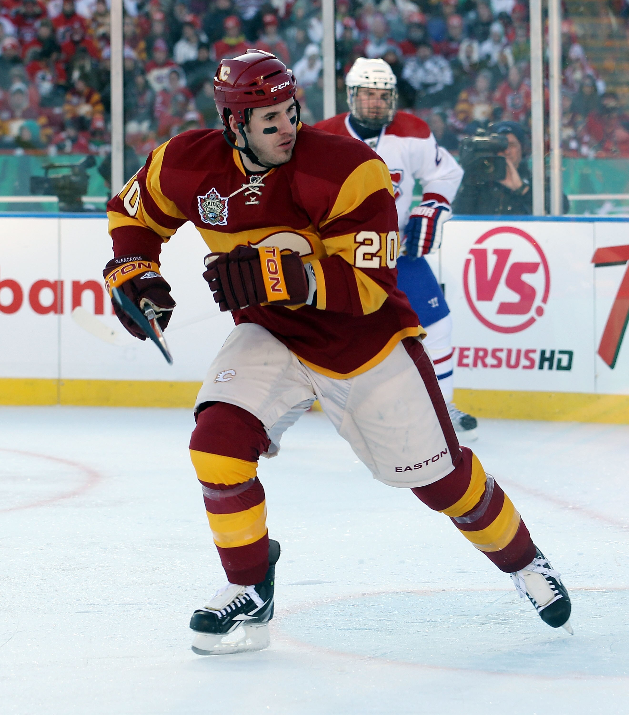 CALGARY, AB - FEBRUARY 20:  Curtis Glencross #20 of the Calgary Flames skates against the Montreal Canadiens during the 2011 NHL Heritage Classic Game at McMahon Stadium on February 20, 2011 in Calgary, Alberta, Canada.  (Photo by Mike Ridewood/Getty Imag