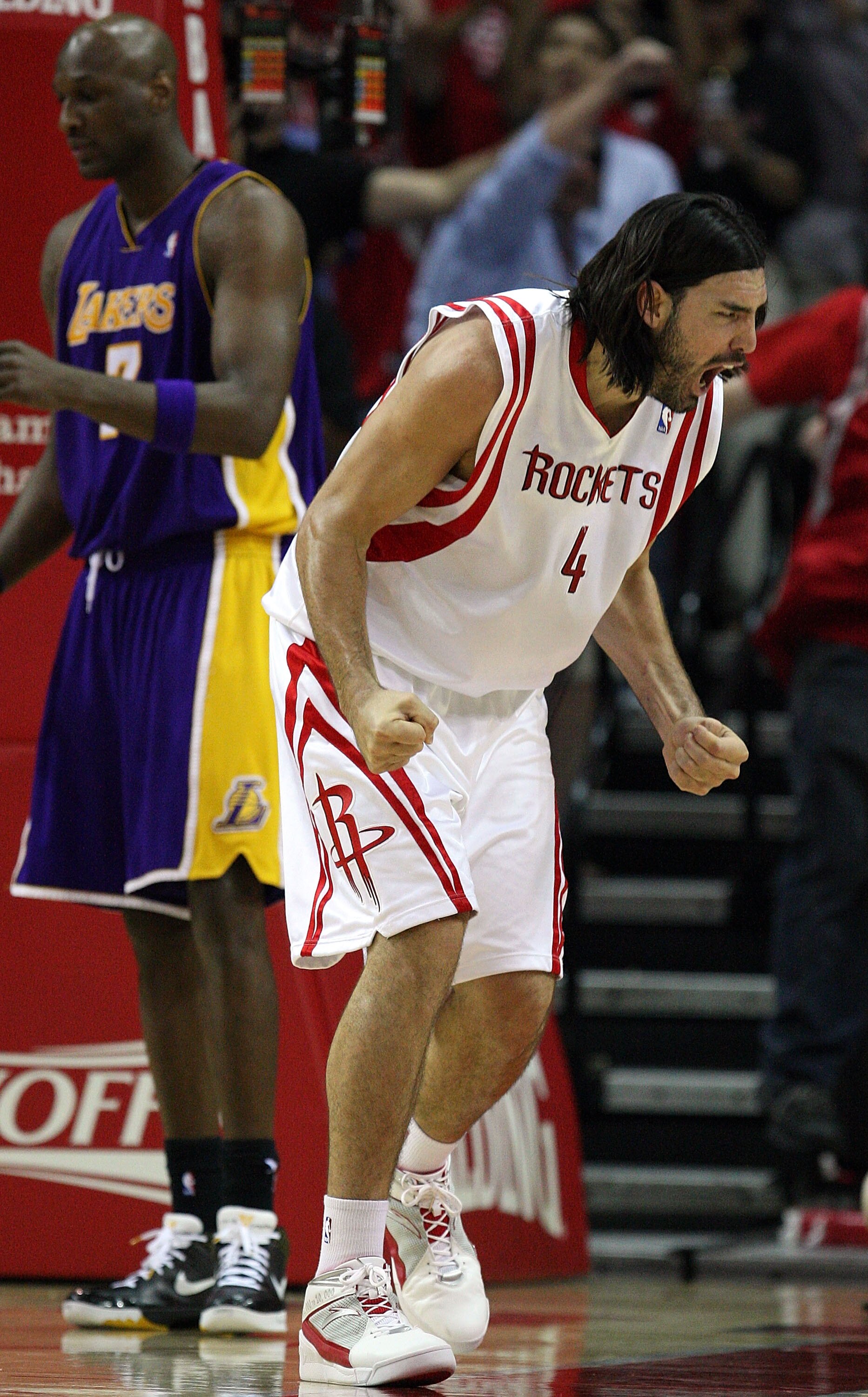 HOUSTON - MAY 14:  Forward Luis Scola #4 of the Houston Rockets reacts after making a shot against the Los Angeles Lakers in Game Six of the Western Conference Semifinals during the 2009 NBA Playoffs at Toyota Center on May 14, 2009 in Houston, Texas. NOT